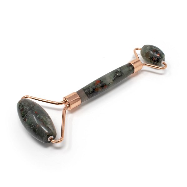 Closeup photo of Bloodstone Facial Roller With Rose Gold Hardware