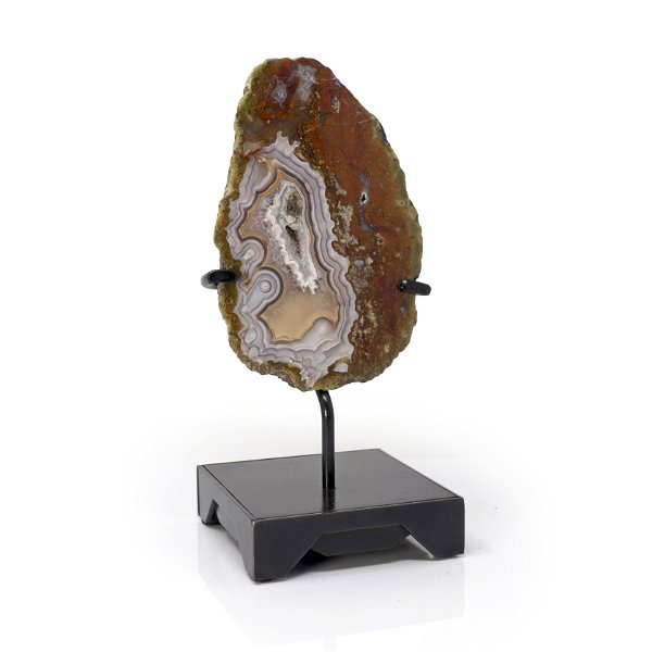 Closeup photo of Agua Nueva Agate Geode On A Custom Black Square Stand With Trapezoidal Designs - Gray And Beige With A Small Druze Pocket