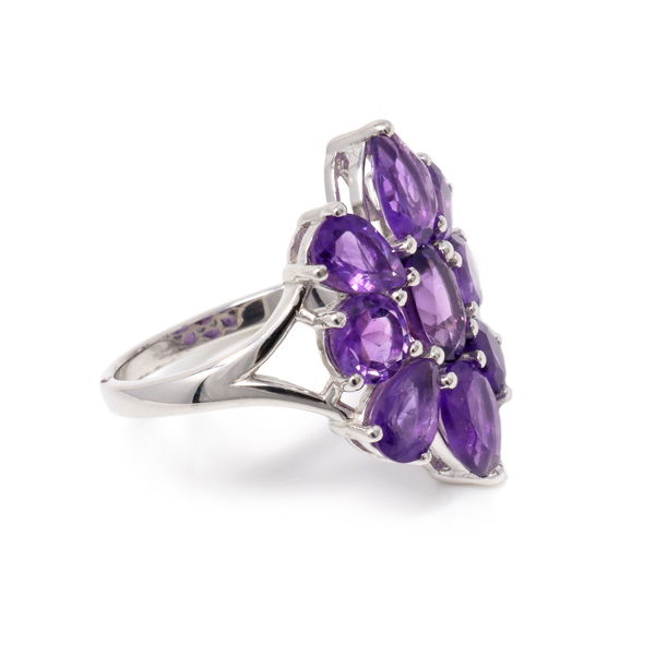 Closeup photo of Amethyst Ring with 9 Faceted Stones in Shape of Dahlia Flower Set on Silver Band with Cutout Top - Prong Set Size 6.5