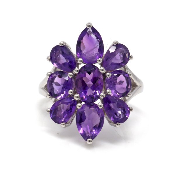 Closeup photo of Amethyst Ring Size 10 - with 9 Faceted Stones In Shape Of Dahlia Flower Set On Silver Band With Cutout Top - Prong Set