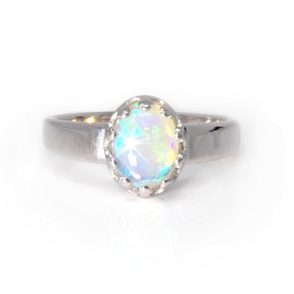 Closeup photo of Ethiopian Opal Ring size 6- Simple Oval Cabochon With Silver Princess Style Bezel & Tapered Band