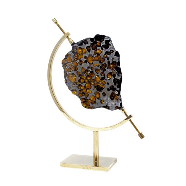 Closeup photo of Brenham Pallasite Meteorite Slice With Super Clarity Gems In Caliper Stand - Etched On One Side