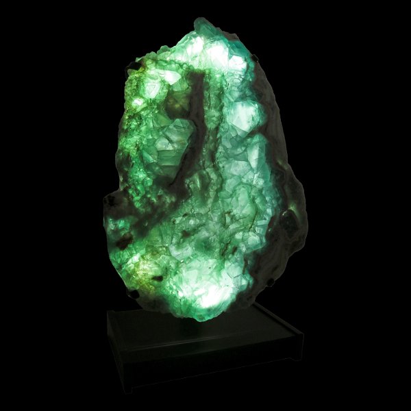 Closeup photo of Green Fluorite Slice In Custom Illuminated Stand With Large Crystal Structure