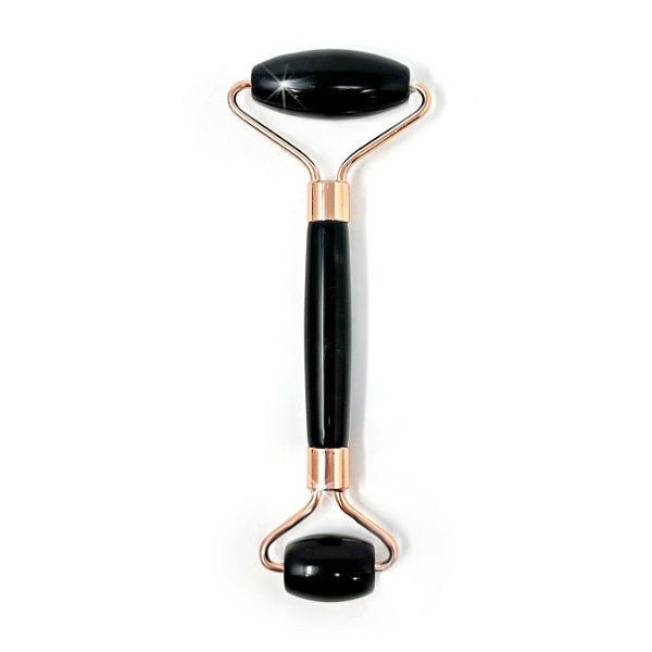 Closeup photo of Black Onyx Facial Roller With Rose Gold Hardware