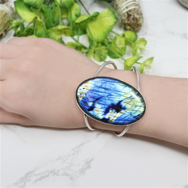 Closeup photo of Labradorite Cuff - Large Oval Cabochon With Simple Silver Bezel On Open Double Band