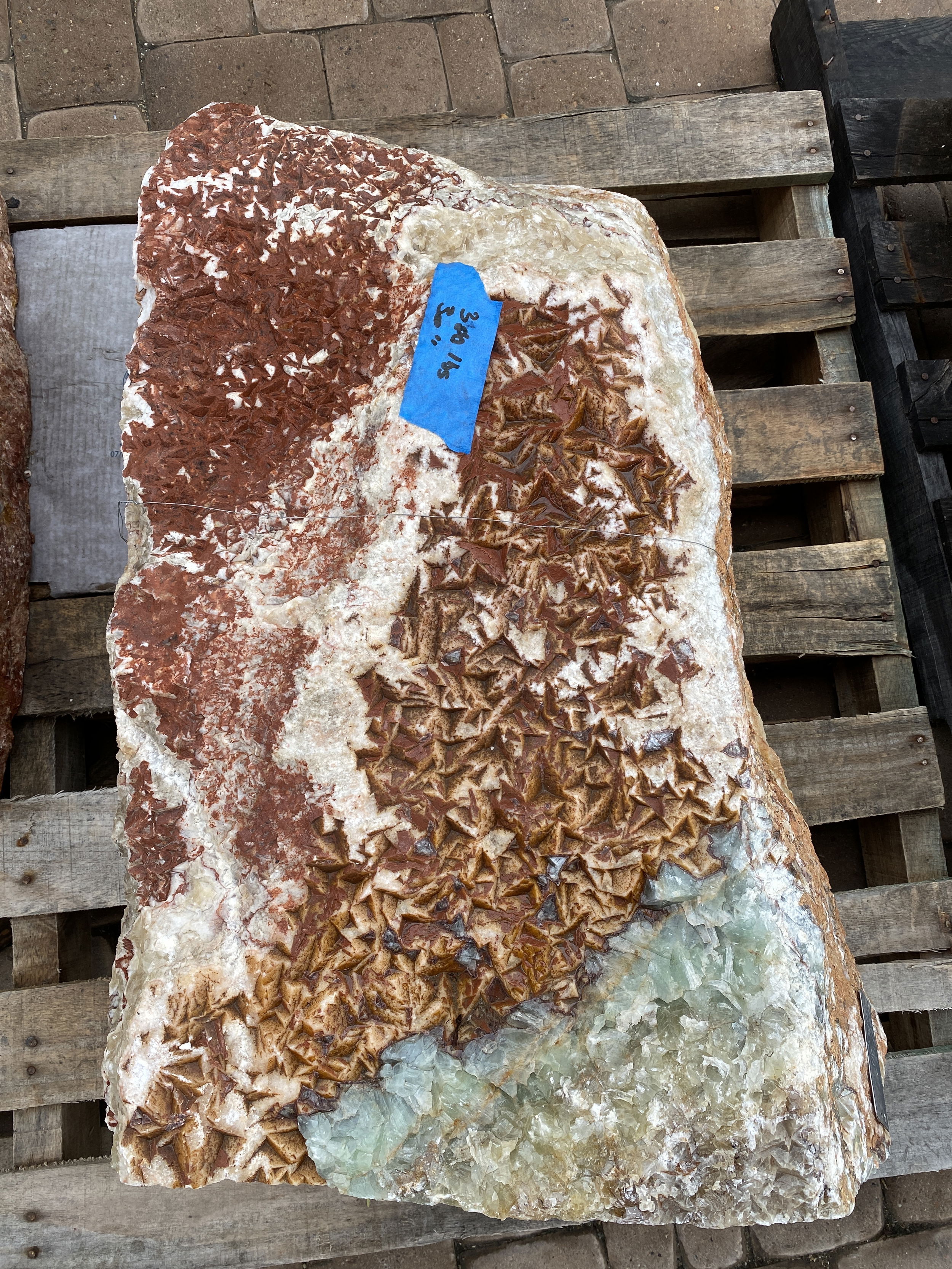 Transform your yard or garden or patio into a tranquil oasis with the Aqua Serpentine Boulder Fountain. Its natural look and soothing water sounds will add an aesthetically pleasing touch to your outdoor space. Let Rare Earth Gallery’s white-glove service make your fountain dreams come true—simply choose your fountain, tell us where it goes, and we’ll handle the rest, from delivery to installation. IMPORTANT: the purchase price listed is for the FOUNTAIN ONLY and DOES NOT INCLUDE the cost of a basin, pump, parts or installation. Before purchasing a fountain online, we STRONGLY recommend you call us at (480) 575-4360 for a FREE consultation to discuss these additional costs and schedule a pre-site inspection. Also, free shipping does NOT apply to fountains, please call for a quote. Aqua Serpentine Boulder Fountain 1-Side Cut