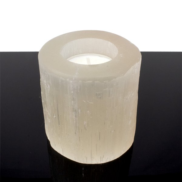 Closeup photo of Peach Selenite Candle Holder -Round With Cut Top