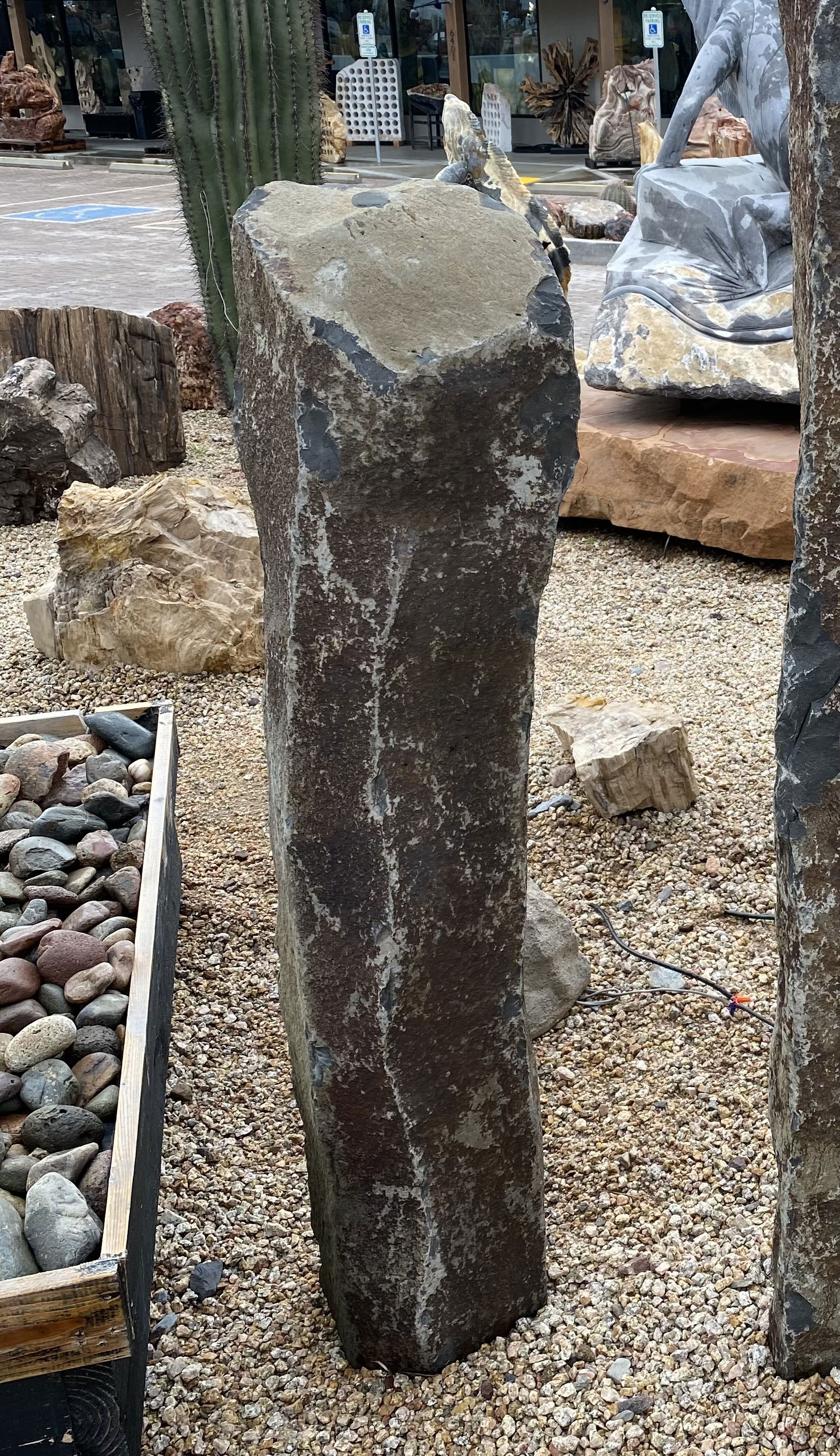 The 4' Red Bluff Basalt Column With Cut Base & Natural Top Fountain is a visually stunning addition for your yard, garden, or patio that brings tranquility and enhances the aesthetics of any space. Crafted from premium basalt, this fountain exudes a sense of natural beauty, creating a serene ambiance for relaxation and enjoyment. Let Rare Earth Gallery’s white-glove service make your fountain dreams come true—simply choose your fountain, tell us where it goes, and we’ll handle the rest, from delivery to installation. IMPORTANT: the purchase price listed is for the FOUNTAIN ONLY and DOES NOT INCLUDE the cost of a basin, pump, parts or installation. Before purchasing a fountain online, we STRONGLY recommend you call us at (480) 575-4360 for a FREE consultation to discuss these additional costs and schedule a pre-site inspection. Also, free shipping does NOT apply to fountains, please call for a quote. 4' Red Bluff Basalt Column With Cut Base & Natural Top Fountain