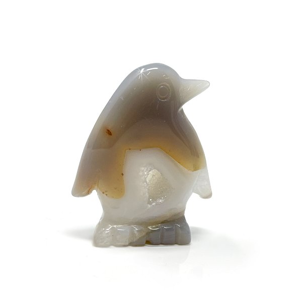 Closeup photo of Agate Druze Geode Penguin Carving