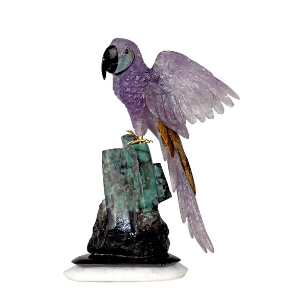 Closeup photo of Amethyst Macaw Perched On Emerald Crystal Base
