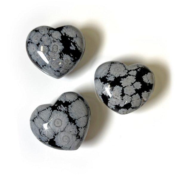 Closeup photo of Snowflake Obsidian Puffy Heart (Singles)