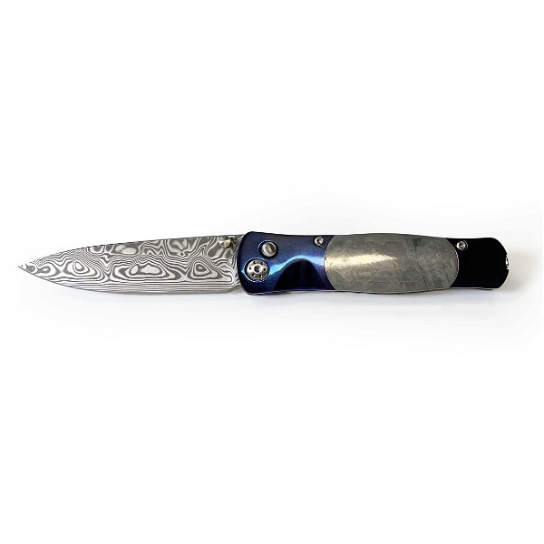 Closeup photo of Munionalusta Meteorite Handle Knife With Damascus Steel Blade And Purple Blue & Black Accents -Small
