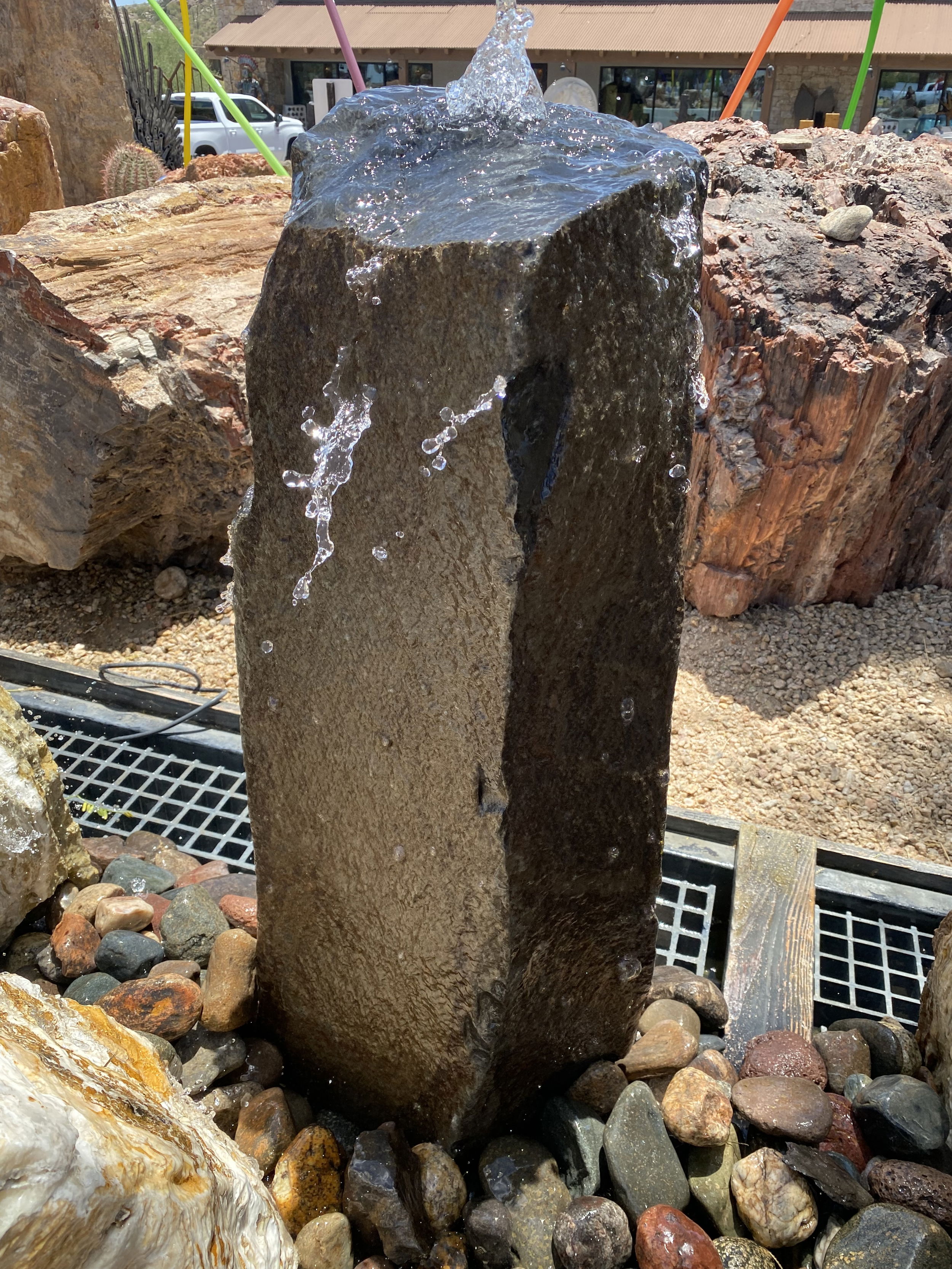 The33" Red Bluff Basalt Column Fountain is a visually stunning addition for your yard, garden, or patio that brings tranquility and enhances the aesthetics of any space. Crafted from premium basalt, this fountain exudes a sense of natural beauty, creating a serene ambiance for relaxation and enjoyment. Let Rare Earth Gallery’s white-glove service make your fountain dreams come true—simply choose your fountain, tell us where it goes, and we’ll handle the rest, from delivery to installation. IMPORTANT: the purchase price listed is for the FOUNTAIN ONLY and DOES NOT INCLUDE the cost of a basin, pump, parts or installation. Before purchasing a fountain online, we STRONGLY recommend you call us at (480) 575-4360 for a FREE consultation to discuss these additional costs and schedule a pre-site inspection. Also, free shipping does NOT apply to fountains, please call for a quote. 33" Red Bluff Basalt Column Fountain