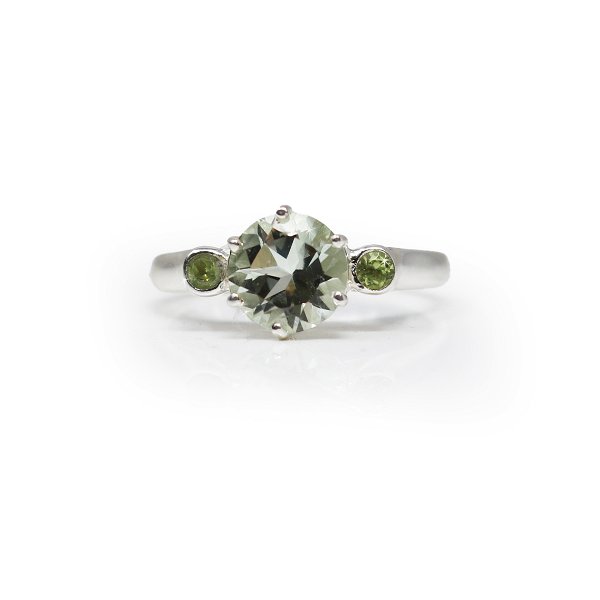 Closeup photo of Prasiolite Ring - Prong Set Faceted Round With Crosshatch Cut Out Bezel & 2 Faceted Peridot Rounds Sz9