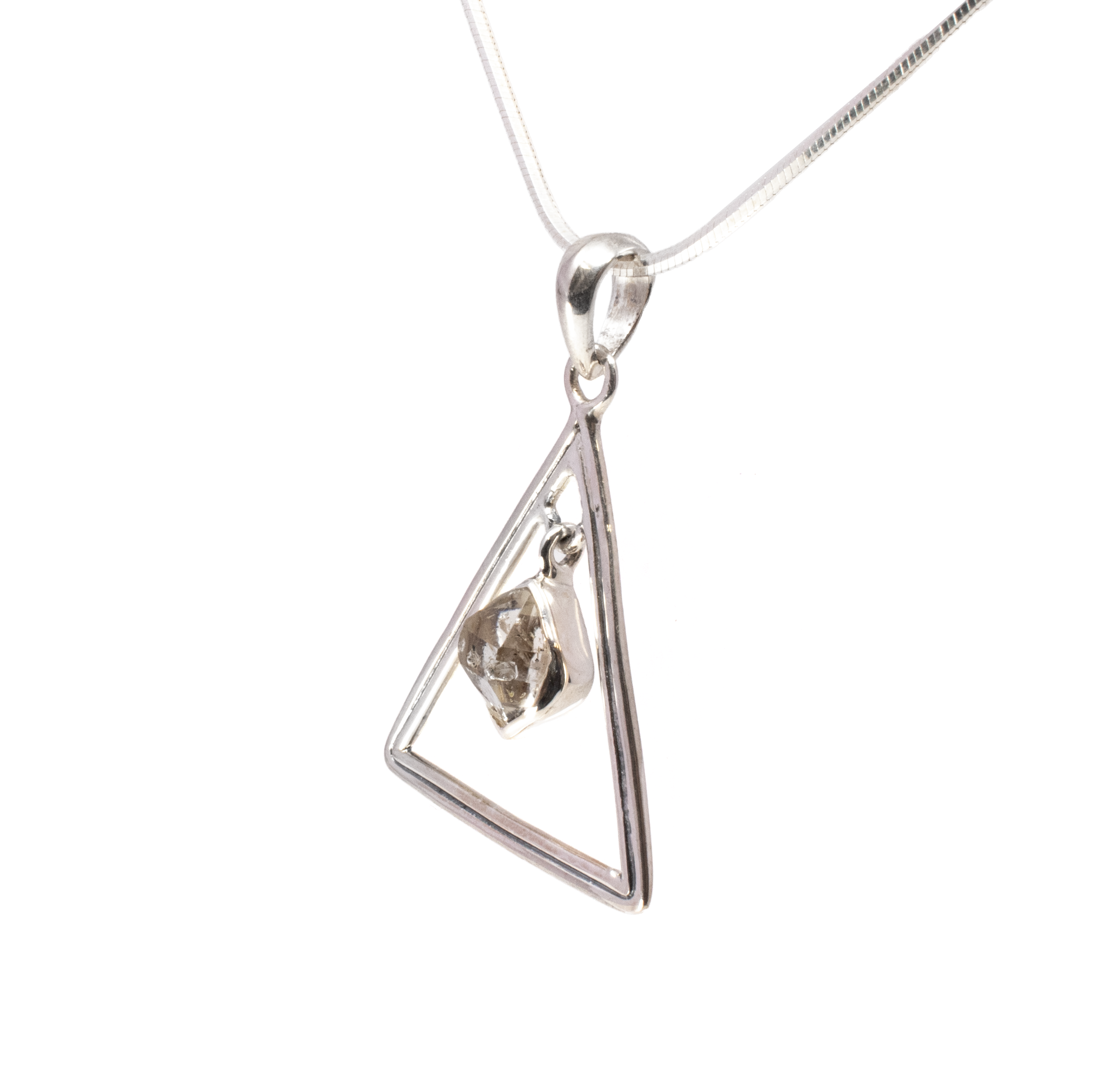 Discover the captivating allure of our Herkimer Diamond Pendant, a contemporary masterpiece designed for the modern jewelry enthusiast. This exquisite pendant showcases a faceted freeform Herkimer diamond, celebrated for its raw beauty and exceptional clarity. Nestled at the heart of a sleek, 925 sterling silver triangle, the pendant captures both elegance and an eclectic edge, making it a standout addition to any jewelry collection.Renowned for its distinctive formations and high brilliance, the Herkimer diamond is a natural semi-precious stone known for its unique, uncut look. This pendant features a carefully selected, faceted freeform Herkimer diamond, radiating sophistication and natural beauty. Herkimer Diamond Pendant - Faceted Freeform Set In Center Of 925 Sterling Silver Triangle