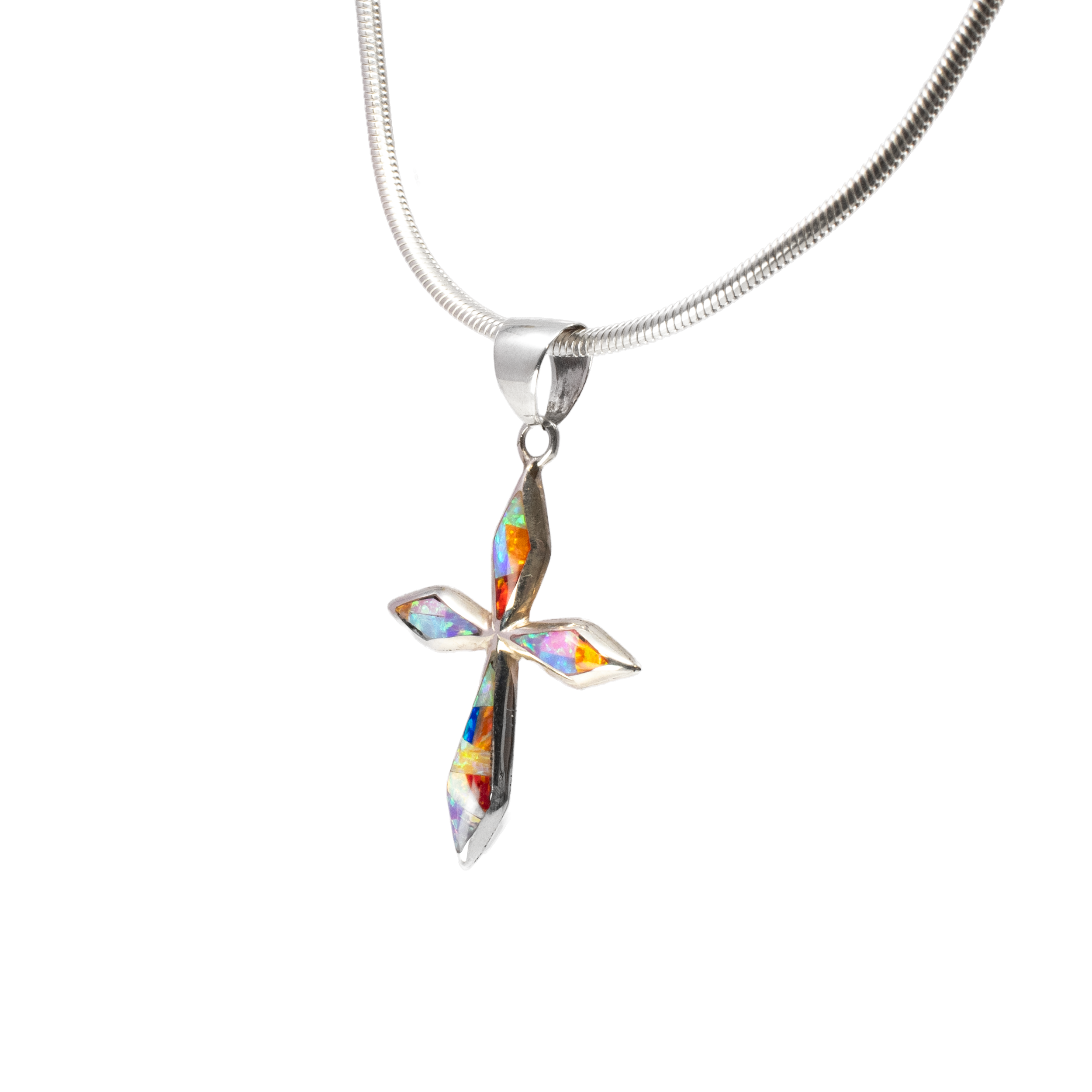 Enhance your jewelry collection with our exquisite Multi Fire Opal Inlay Cross Pendant, a stunning piece that beautifully combines spirituality with artistry. Crafted with care, this geometric inlay pendant showcases a vibrant array of multi fire opals, known for their mesmerizing play of colors that dance in the light. Each opal is meticulously set within the dainty 925 sterling silver cross, ensuring a seamless and captivating look.The pendant features a sophisticated design with tapered arms, giving it an elegant silhouette that complements any neckline. The inlaid opals create a kaleidoscope of colors, from deep blues and fiery reds to shimmering greens, making this pendant a true statement piece. Perfect for those who appreciate fine craftsmanship and the beauty of natural gemstones, the Multi Fire Opal Inlay Cross Pendant is a dazzling representation of faith and fashion. Multi Fire Opal Inlay Cross Pendant - Geometric Inlay Set in Dainty 925 Sterling Silver Cross with Tapered Arms
