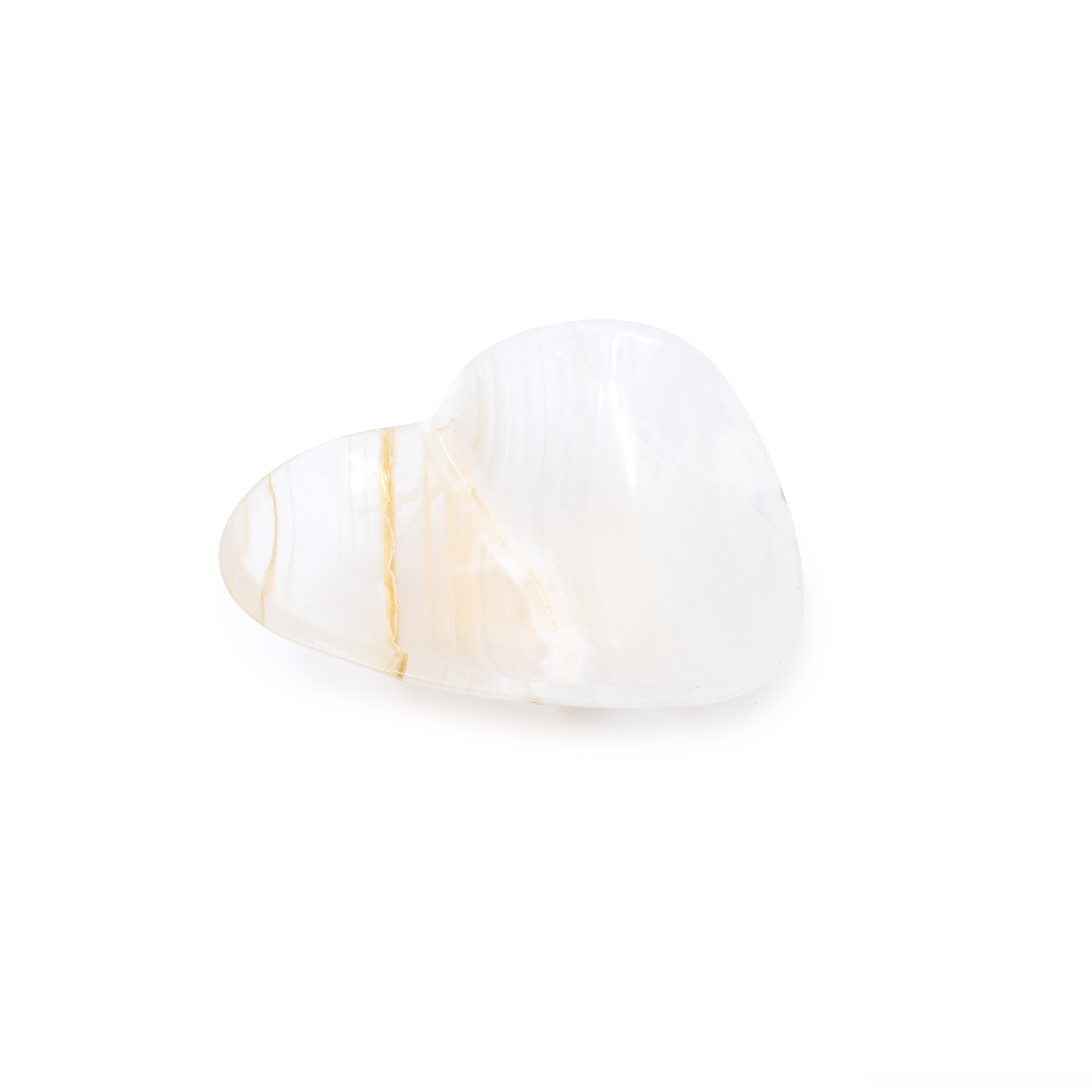 Introducing the Pearlescent Onyx Heart Vessel, a captivating masterpiece that encapsulates the natural beauty and elegance of Mexican Onyx. This exquisite heart-shaped vessel is crafted with meticulous attention to detail, showcasing the enchanting interplay of soothing colors and unique patterns that are signature to onyx.Each Pearlescent Onyx Heart Vessel is a testament to nature's artistry, with swirling patterns and layering that reflect the earth's processes over centuries. The heart shape adds a symbolic touch, embodying love, comfort, and protection, making it a profound piece for intimate spaces or thoughtful gifting.This vessel serves as a stunning decorative piece, whether on a mantel, desk, or shelf. Its gently hollowed interior provides a perfect nook for holding small treasures, potpourri, or cherished mementos. The elegant design complements various interior styles, from bohemian to modern minimalist. Pearlescent Onyx Heart Vessel