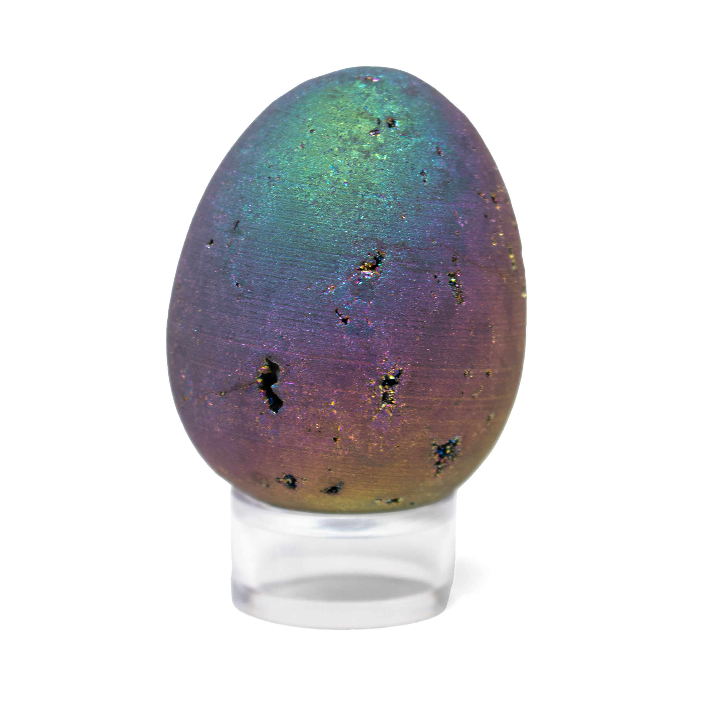 Experience a burst of color and crystal magic with our Rainbow Titanium Druze Egg, hand-carved from natural mineral and finished with a shimmering titanium aura. The druzy surface sparkles in brilliant shades of purple, blue, gold, and teal, creating a vibrant, otherworldly glow that captivates from every angle.Each egg is entirely unique, making it a standout addition to any crystal collection, meditation space, or decorative display. Celebrated for its uplifting energy, Rainbow Titanium Druze is believed to inspire joy, vitality, and transformation—offering both aesthetic beauty and metaphysical charm in one radiant piece. Rainbow Titanium Druze Egg