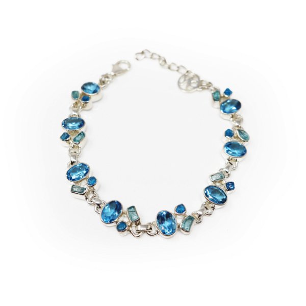 Closeup photo of Blue Topaz Link Bracelet - 8 Faceted Ovals with 16 Rough Blue Apatite Freeforms & 925 Sterling Silver Bezels