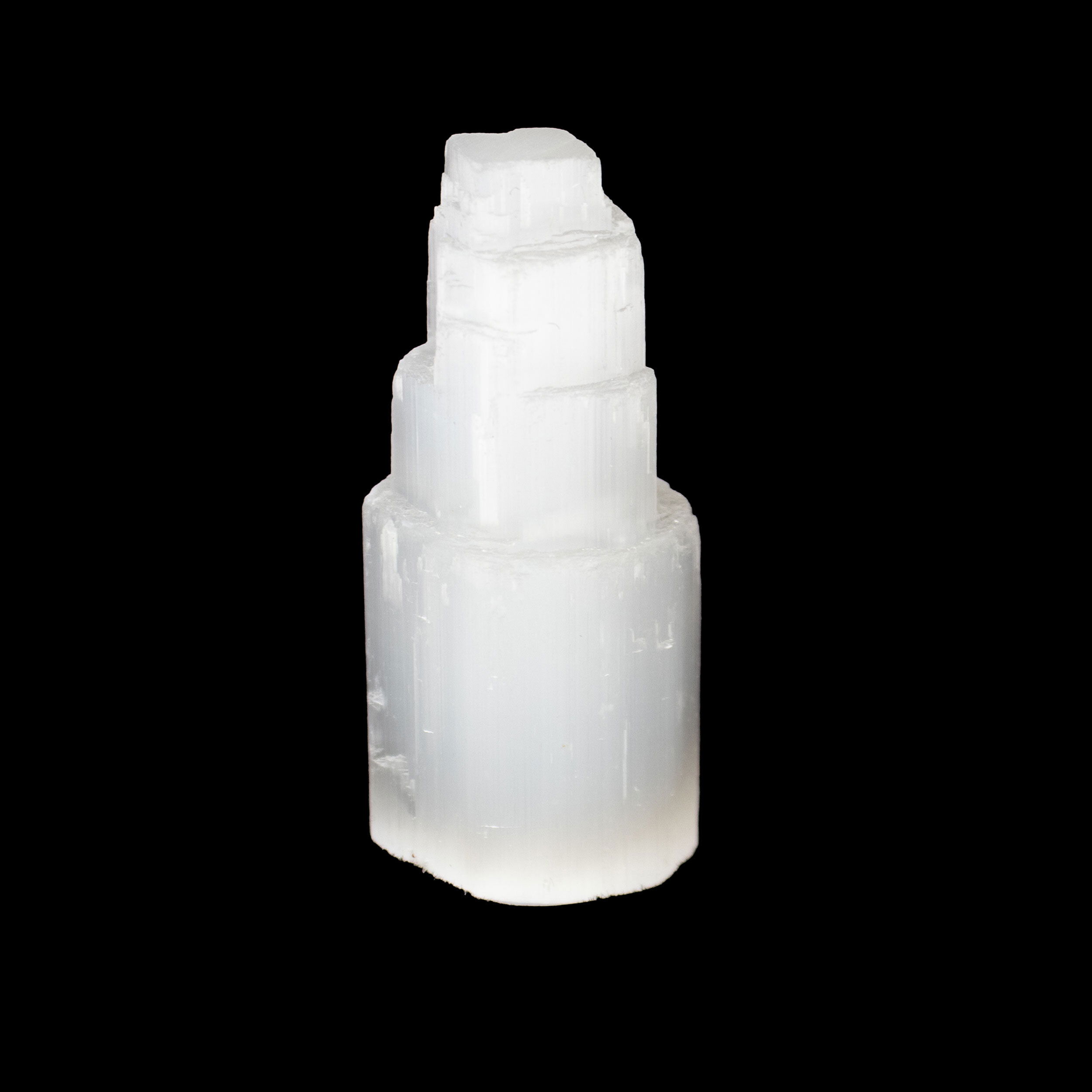 Elevate your crystal collection with this mesmerizing Selenite Castle from Morocco, expertly carved from natural selenite sourced in the deserts of North Africa. Each tower glows with ethereal light and features the soft striations unique to Moroccan selenite, creating a piece that is both grounding and otherworldly.Ideal for energy cleansing, meditation, or as a captivating home accent, this rough mineral specimen brings clarity, peace, and a touch of magic to any space. Revered for its calming properties, the Selenite Castle is a radiant addition to any crystal lover’s collection. Selenite Castle from Morocco