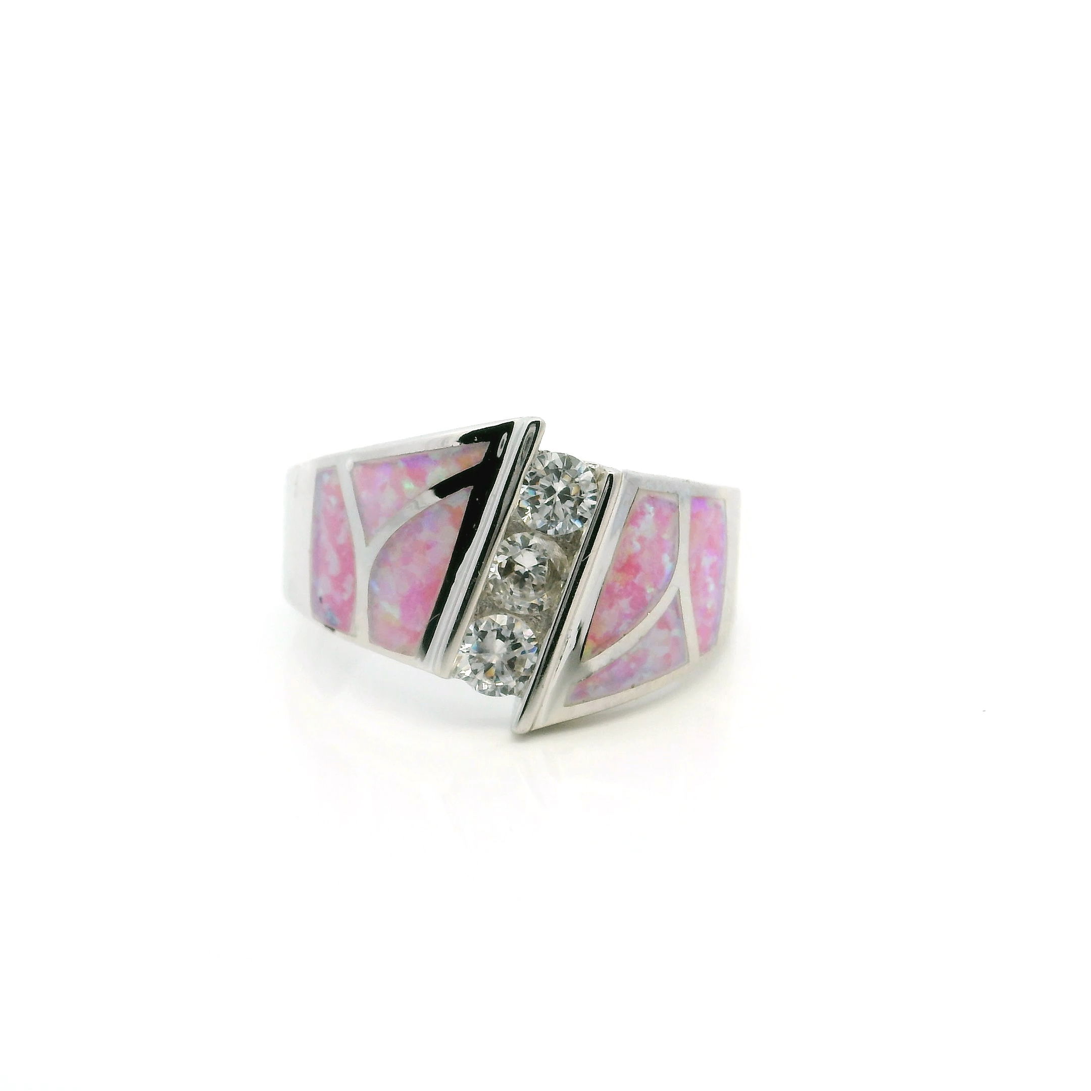 This rare and beautiful Pink Opal Ring with Curved Inlay Band with White Czs and Rose Gold Overlay is perfect for any occasion. It is crafted with 925 Sterling Silver, with a unique curved design and delicate white Czs and Rose Gold Overlay setting. This ring is a statement piece that stands out with its vibrant and unique pink hue. Let this ring be the perfect way to show your unique style and personality. The size 8 ring is sure to be admired. Get yours today, exclusively at Rare Earth Gallery. Pink Opal Ring Size 8 - Curved Inlay Band with White Czs