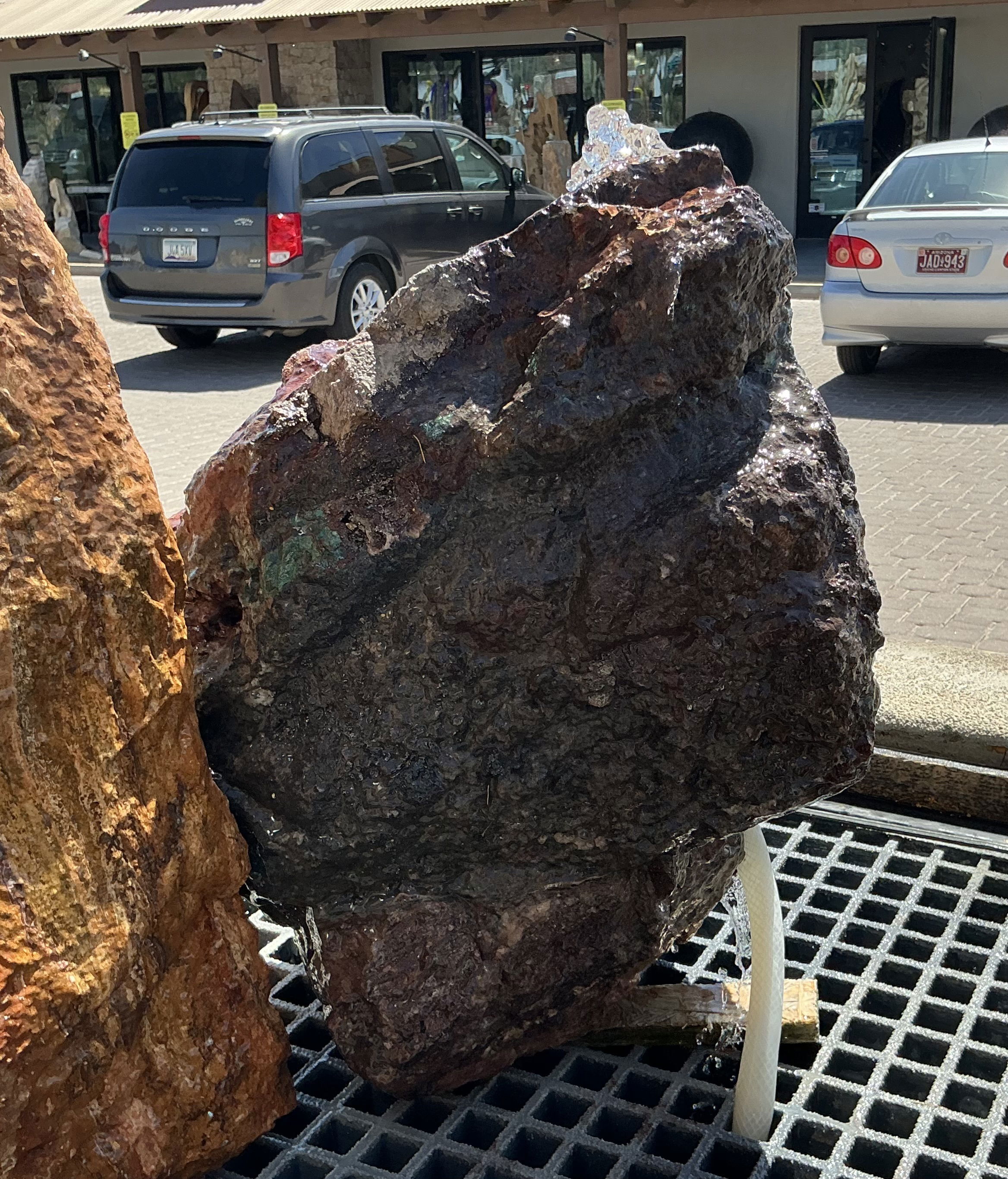 The Moonlight Mine Copper Boulder Fountain brings tranquility and beauty to your yard, garden, or patio, with its mesmerizing cascades and elegant copper boulders. Experience the soothing sounds of flowing water and enhance the aesthetics of your outdoor space with this captivating fountain. Let Rare Earth Gallery’s white-glove service make your fountain dreams come true—simply choose your fountain, tell us where it goes, and we’ll handle the rest, from delivery to installation. IMPORTANT: the purchase price listed is for the FOUNTAIN ONLY and DOES NOT INCLUDE the cost of a basin, pump, parts or installation. Before purchasing a fountain online, we STRONGLY recommend you call us at (480) 575-4360 for a FREE consultation to discuss these additional costs and schedule a pre-site inspection. Also, free shipping does NOT apply to fountains, please call for a quote. Moonlight Mine Copper Boulder Fountain