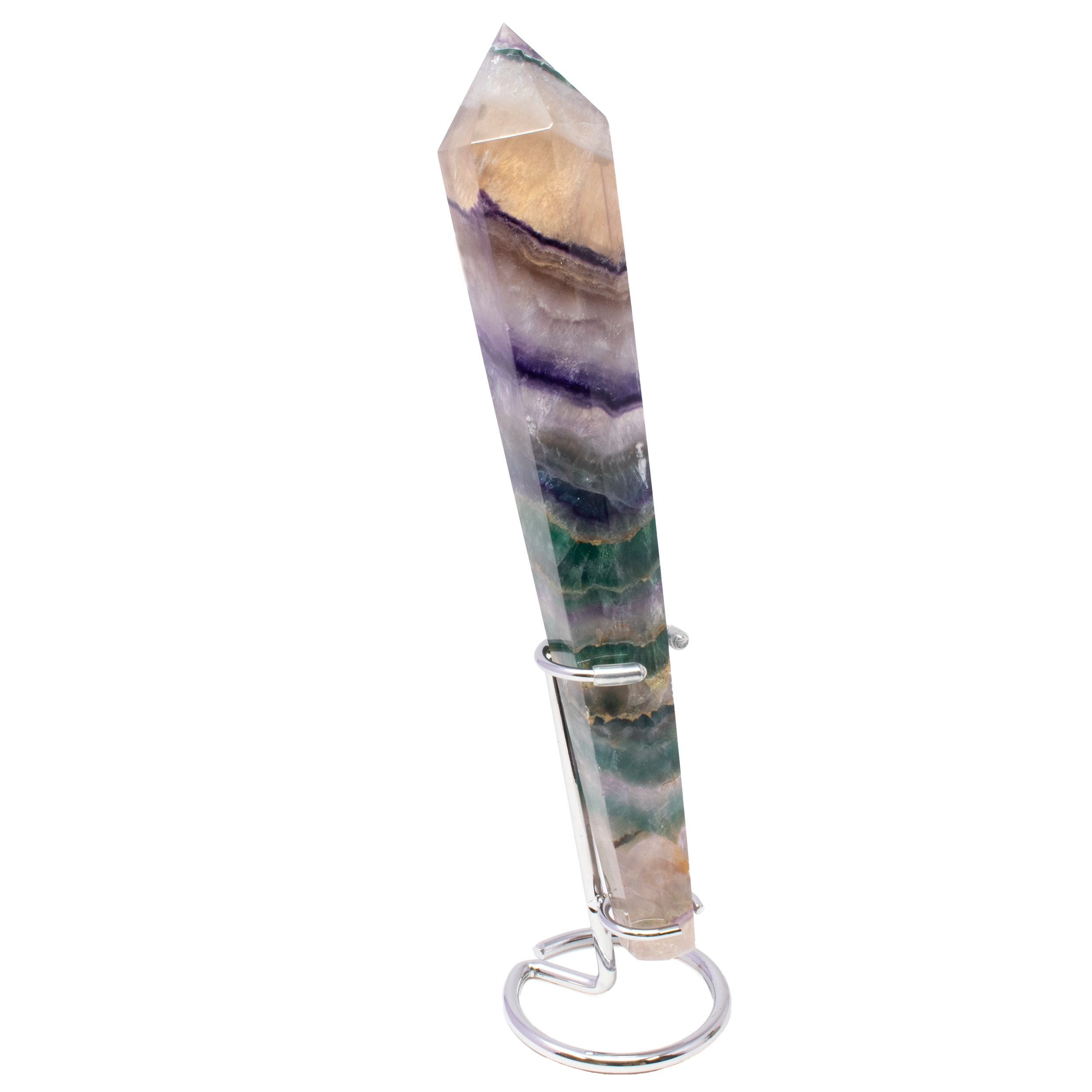 Introducing our Rainbow Fluorite Tapered Point with a Stainless Steel Spiral Stand—a stunning centerpiece for any crystal enthusiast or home decor aficionado. This exquisite piece showcases the natural beauty of rainbow fluorite, known for its mesmerizing bands of vibrant purple, green, blue, and clear hues. Fluorite is know as the "Genius Stone" and is said to promote clarity of mind and focus. This tapered point is meticulously crafted to highlight the fluorite's unique color variations and delicate translucency, making it a captivating addition to your collection of crystals and minerals. Rainbow Fluorite Tapered Point with Stainless Steel Spiral Stand