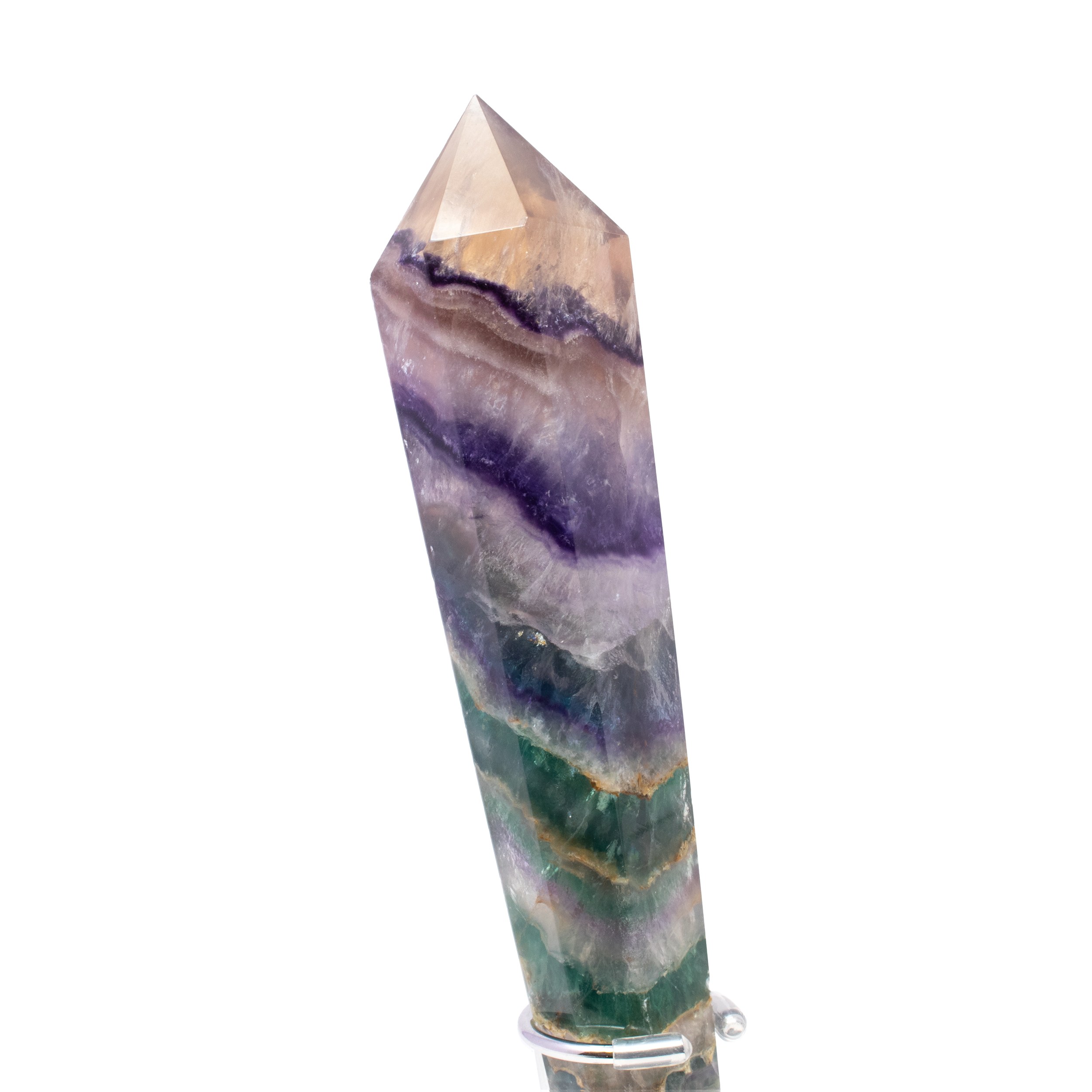 Awaken your spirit and illuminate your space with the mesmerizing beauty of our Large Rainbow Fluorite Tapered Point, elegantly cradled in a chic stainless steel spiral stand. This stunning piece is not just a crystal; it is a masterpiece of nature and a testament to the captivating allure of minerals.This crystal showcases the vibrant, naturally occurring hues of Rainbow Fluorite, ranging from deep purples and blues to fresh greens and sunny yellows. Each point is a unique creation, with its own distinct banding and color patterns, making it a one-of-a-kind addition to your crystal collection. Rainbow Fluorite Tapered Point with Stainless Steel Spiral Stand
