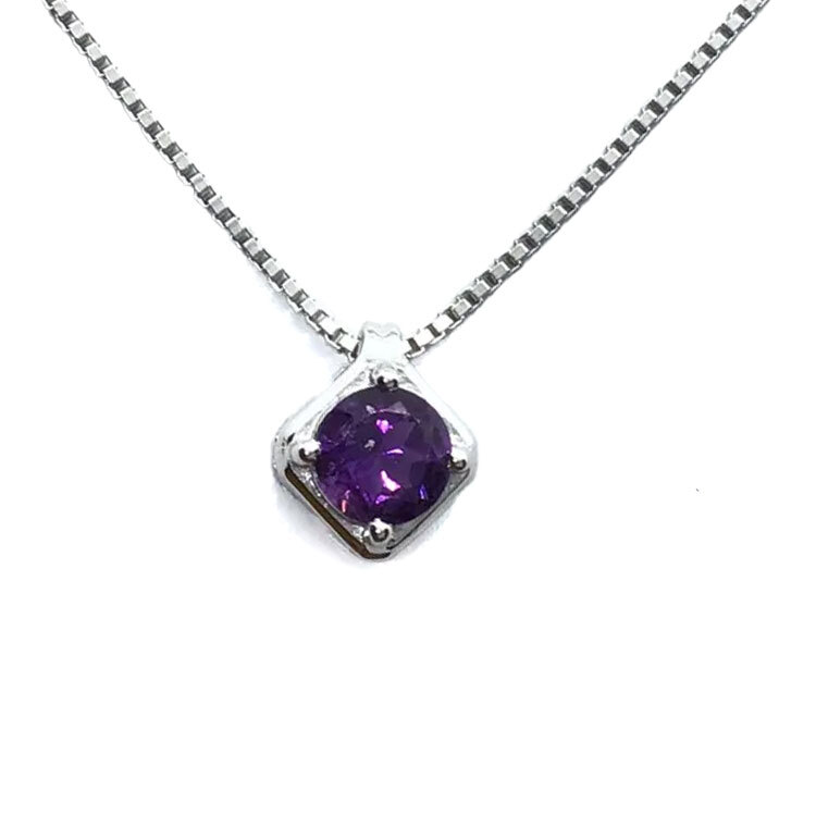 Elevate your elegance with our Faceted Amethyst Necklace, featuring a dazzling round amethyst gemstone meticulously prong-set on a 925 sterling silver cutout base. The rich purple hues of the amethyst capture the light with every movement, while the rhodium-plated box chain adds a contemporary shine and lasting durability. Faceted Amethyst Necklace - Round Prong Set on 925 Sterling Silver Cutout Base with Rhodium Box Chain