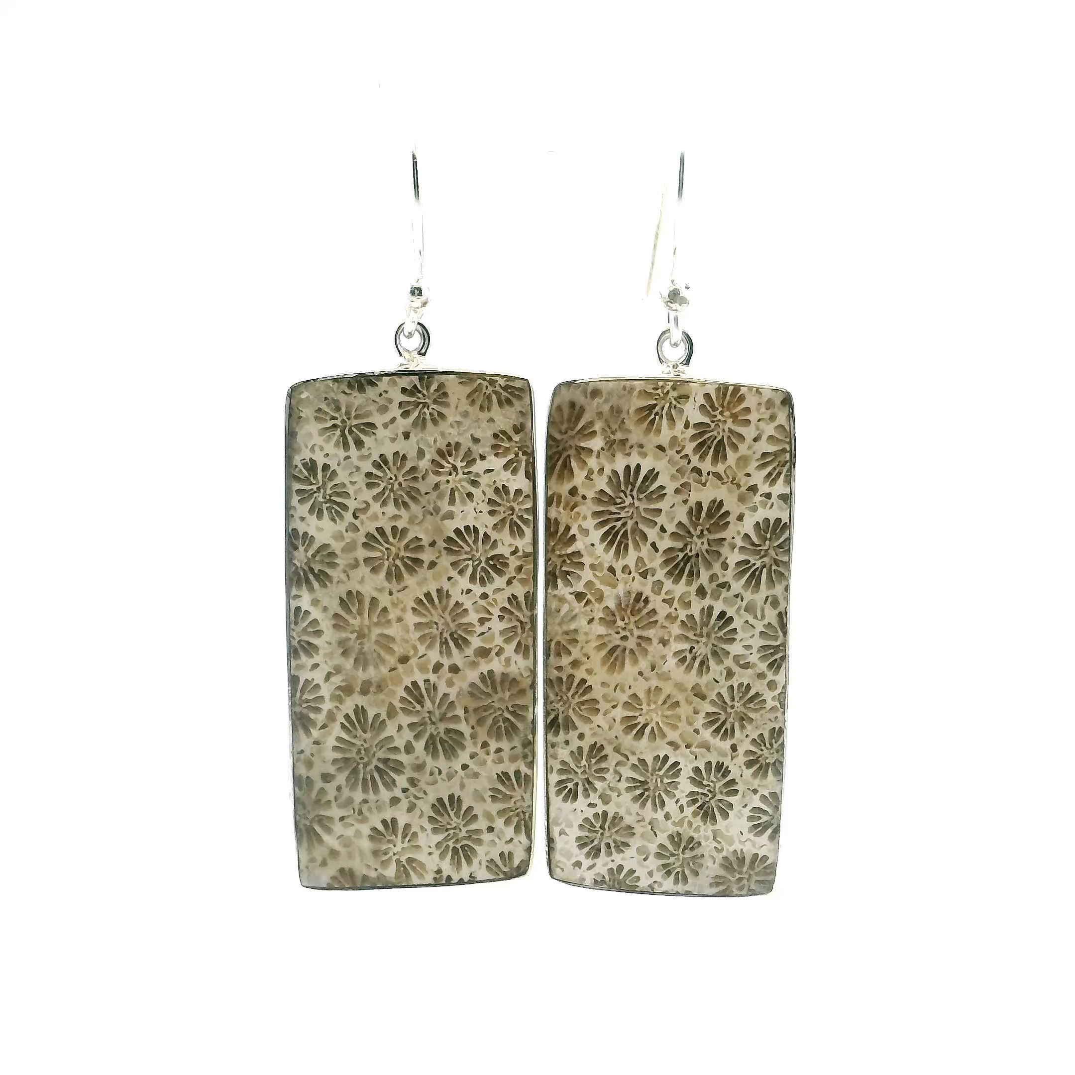 These Fossilized Coral Dangle Earrings in 925 Sterling Silver showcase the quiet majesty of ancient marine life transformed by time. Each flat rectangular cabochon of genuine fossilized coral reveals delicate, flower-like patterns formed over millions of years, preserved in earthy, muted tones that speak to their organic origin. Bezel set in polished sterling silver, the stones dangle with understated grace, offering both natural intrigue and timeless style.Lightweight yet visually striking, these earrings are perfect for everyday wear or thoughtful gifting. A refined choice for women who appreciate the poetry of the past woven into modern design, they embody elegance with a story etched in stone. Fossilized Coral Dangle Earrings - Flat Cut Rectangle with Simple 925 Sterling Silver Bezel