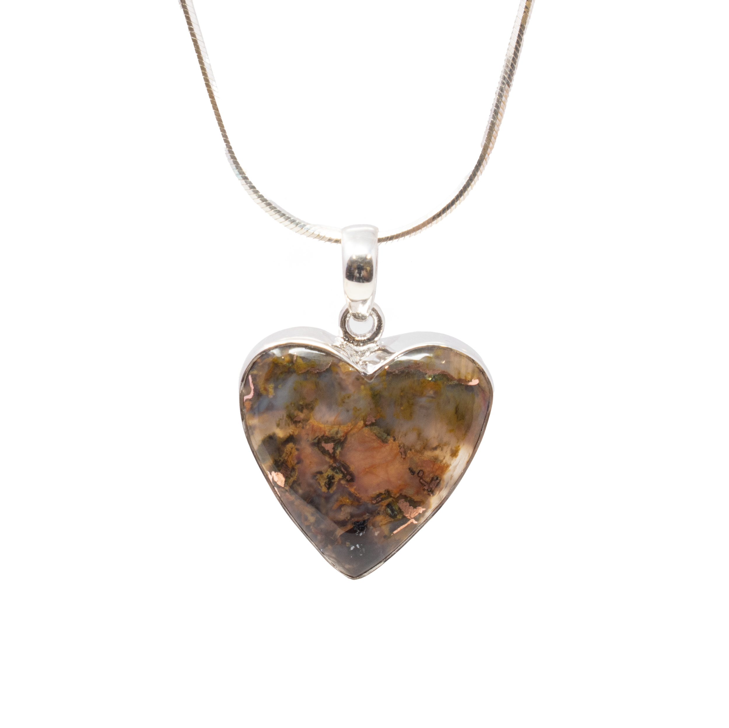 Introducing the Native Copper Pendant - a stunning piece that effortlessly combines timeless elegance with a hint of natural allure. This exquisite pendant features a beautifully crafted classic heart cabochon, showcasing the unique and striking beauty of native copper. Each heart cabochon highlights the radiant, earthy tones and distinctive patterns inherent to copper, making every pendant a truly one-of-a-kind accessory.Encasing this captivating cabochon is a simple yet sophisticated rhodium plated 925 sterling silver bezel. The rhodium plating not only enhances the sheen and durability of the sterling silver but also provides a luxurious contrast to the warm, rich hues of the copper. The minimalist design of the bezel ensures that the pendant remains versatile, easily complementing a wide range of styles and occasions.Chain not included. Native Copper Pendant - Classic Heart Cabochon with Simple Rhodium Plated 925 Sterling Silver Bezel