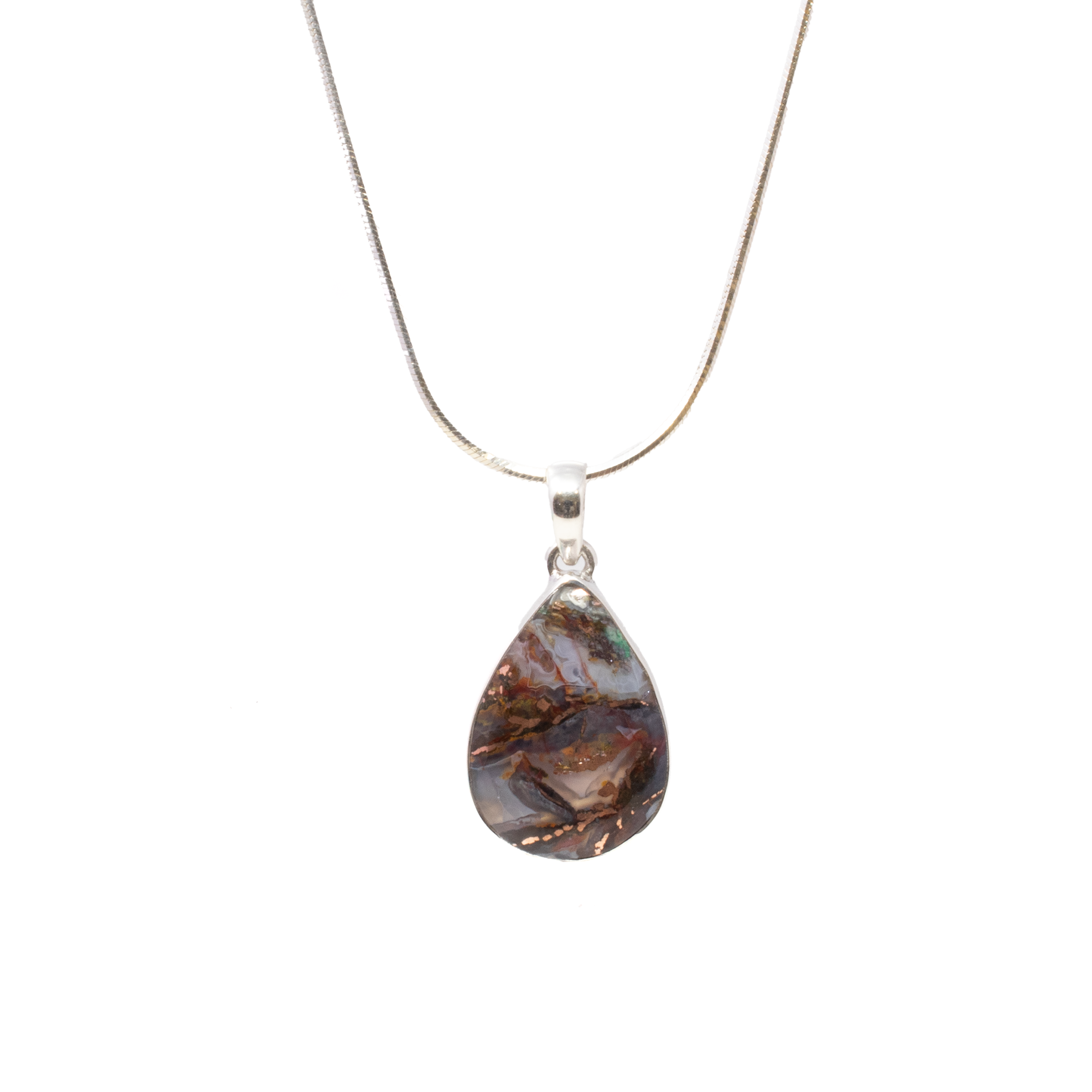 Discover elegance and earthy charm with our Native Copper Pendant, featuring a classic pear cabochon design. This exquisite piece showcases the rich, natural beauty of copper, perfectly encased in a simple, yet sophisticated, rhodium-plated 925 sterling silver bezel. Expertly crafted for the discerning woman, this pendant seamlessly blends rustic allure with modern refinement, making it a versatile addition to any jewelry collection. Its warm, metallic tones complement and enhance both casual and formal ensembles, making it a captivating statement piece for any occasion. Whether you're gifting a loved one or treating yourself, this native copper pendant embodies timeless elegance and thoughtful craftsmanship. Indulge in the unique allure of this beautiful accessory and let your style shine effortlessly. Chain not included. Native Copper Pendant - Classic Pear Cabochon with Simple Rhodium Plated 925 Sterling Silver Bezel