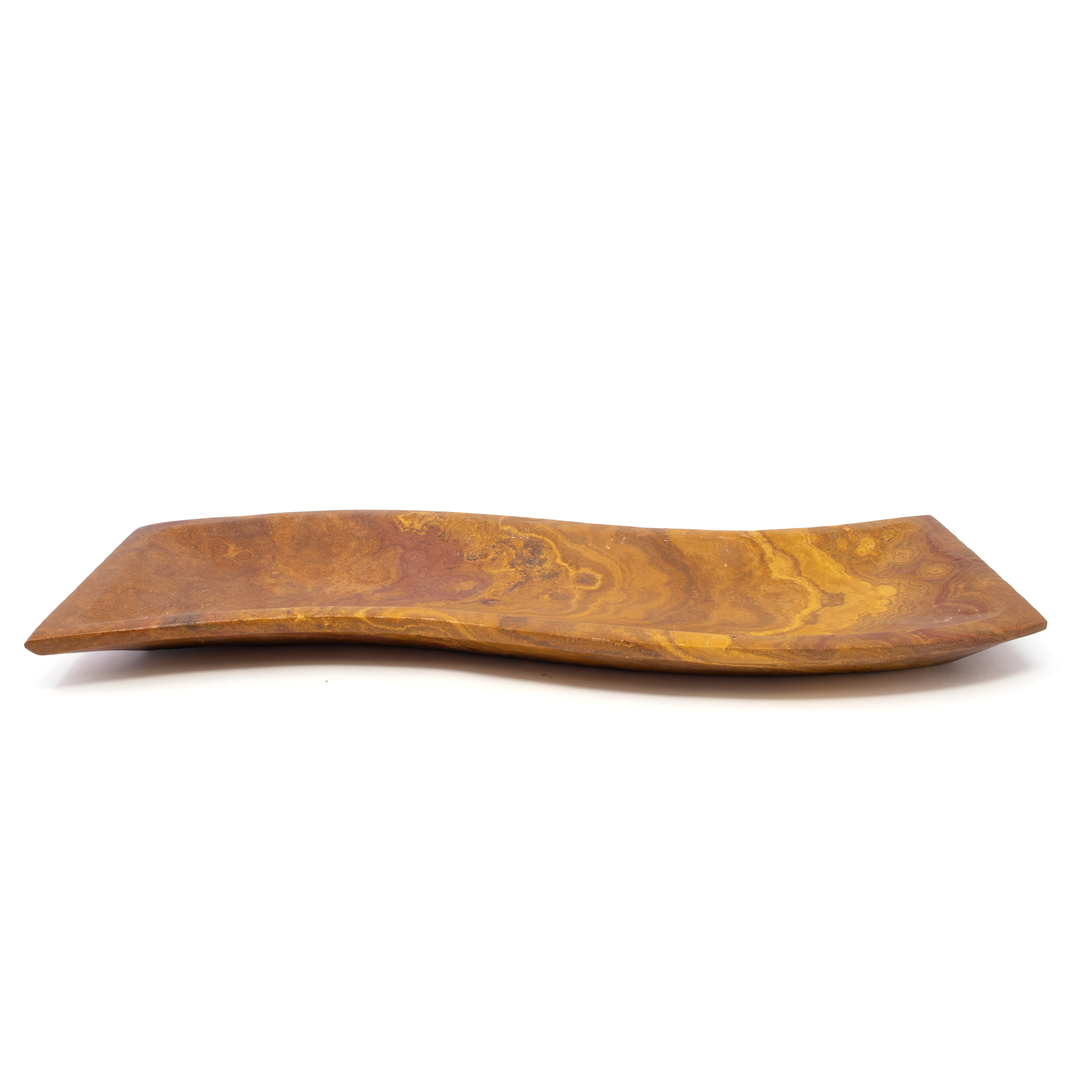 Elevate your home decor with the exquisite Carmel Travertine Tray, designed specifically for her and perfect for any discerning taste. This elegant flat tray, featuring an eye-catching S curve, effortlessly combines functionality with a touch of artistic flair, making it the perfect addition to any room in your home.Handcrafted from premium quality travertine, this tray showcases the natural beauty and unique variations of the stone, ensuring each piece is truly one-of-a-kind. The soft, neutral hues of the travertine add an earthy sophistication that complements a wide range of interior styles, from modern minimalism to classic elegance. Carmel Travertine Tray - Flat with S Curve