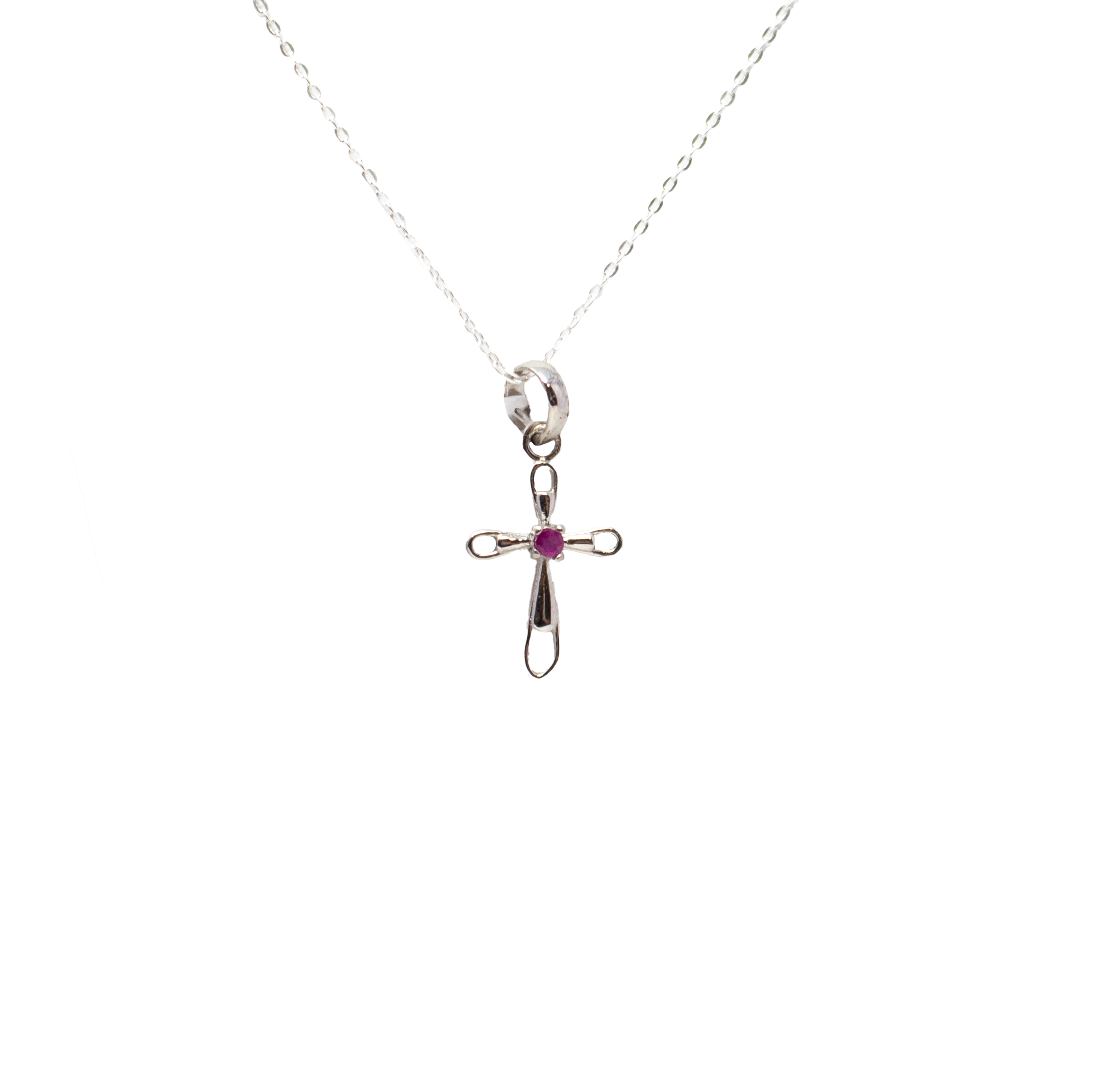 Delicate yet impactful, this Faceted Ruby Pendant features a prong-set round ruby at the center of a rhodium-plated 925 sterling silver cross. Light-catching cutout edges lend a refined, modern touch, while the vivid red gemstone adds warmth and meaning. A timeless design with subtle brilliance—perfect for everyday wear or as a heartfelt gift. Faceted Ruby Pendant - Dainty 925 Sterling Silver (Rhodium Plated) Cross with Prong Set Round in Center & Cutout Edge