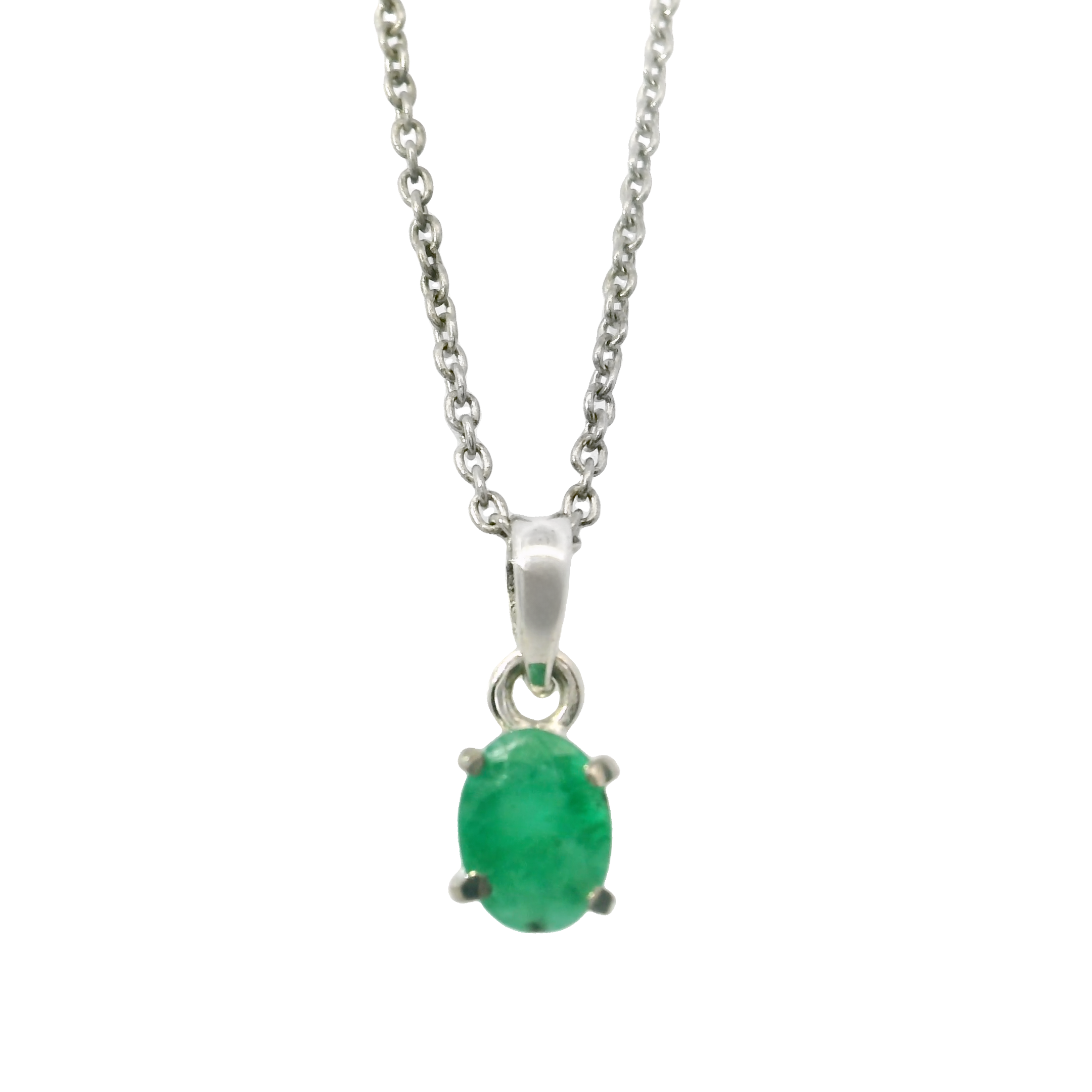 Introducing our exquisite Faceted Emerald Necklace, a delicate blend of elegance and sophistication. This stunning piece features a dainty, prong-set oval emerald, renowned for its vibrant green hue and timeless appeal. The faceted cut of the emerald ensures it catches the light beautifully, adding a touch of sparkle to any outfit.Nestled in a classic 925 sterling silver setting, the emerald pendant exudes a sense of luxury while maintaining a versatile, understated charm. The necklace is suspended on a finely crafted sterling silver box chain, known for its durability and subtle shine, making it an ideal choice for daily wear or special occasions. Faceted Emerald Necklace - Dainty Prong Set Oval with 925 Sterling Silver Box Chain