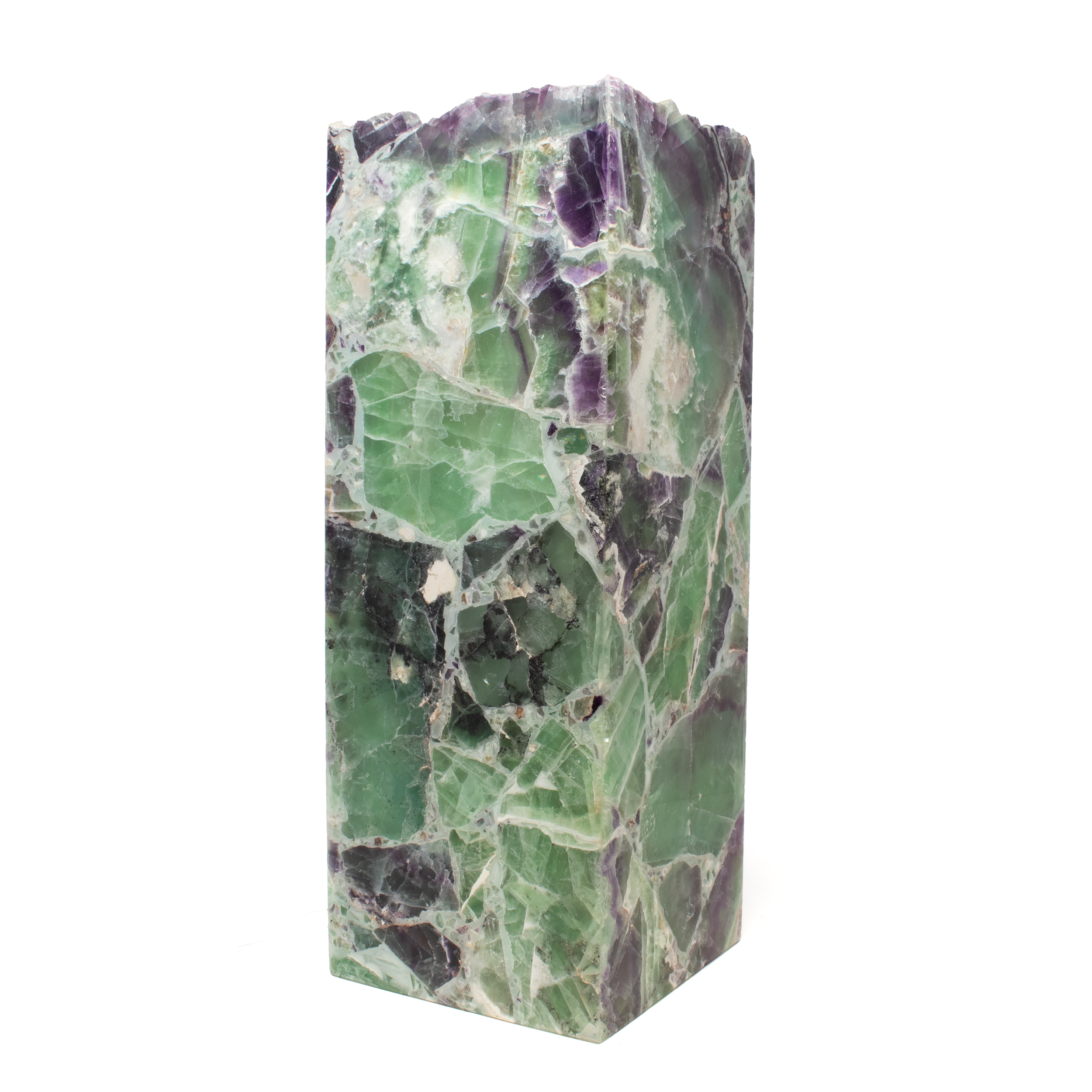 Introducing the Fluorite Square Luminary with Open Top, a captivating addition to any home decor collection that seamlessly blends elegance with natural beauty. Crafted from exquisite fluorite, this luminary boasts a stunning, translucent appearance that transforms ambient light into a mesmerizing display of color and pattern. Its square design complements both modern and traditional settings, while the open top ensures optimal illumination and an inviting glow.Perfect for creating a serene and calming atmosphere, the Fluorite Square Luminary is a versatile accent piece suitable for living rooms, bedrooms, or meditation spaces. Each luminary is uniquely crafted, highlighting the natural variations and stunning hues inherent in fluorite, from soothing greens to serene purples. Fluorite Square Luminary with Open Top