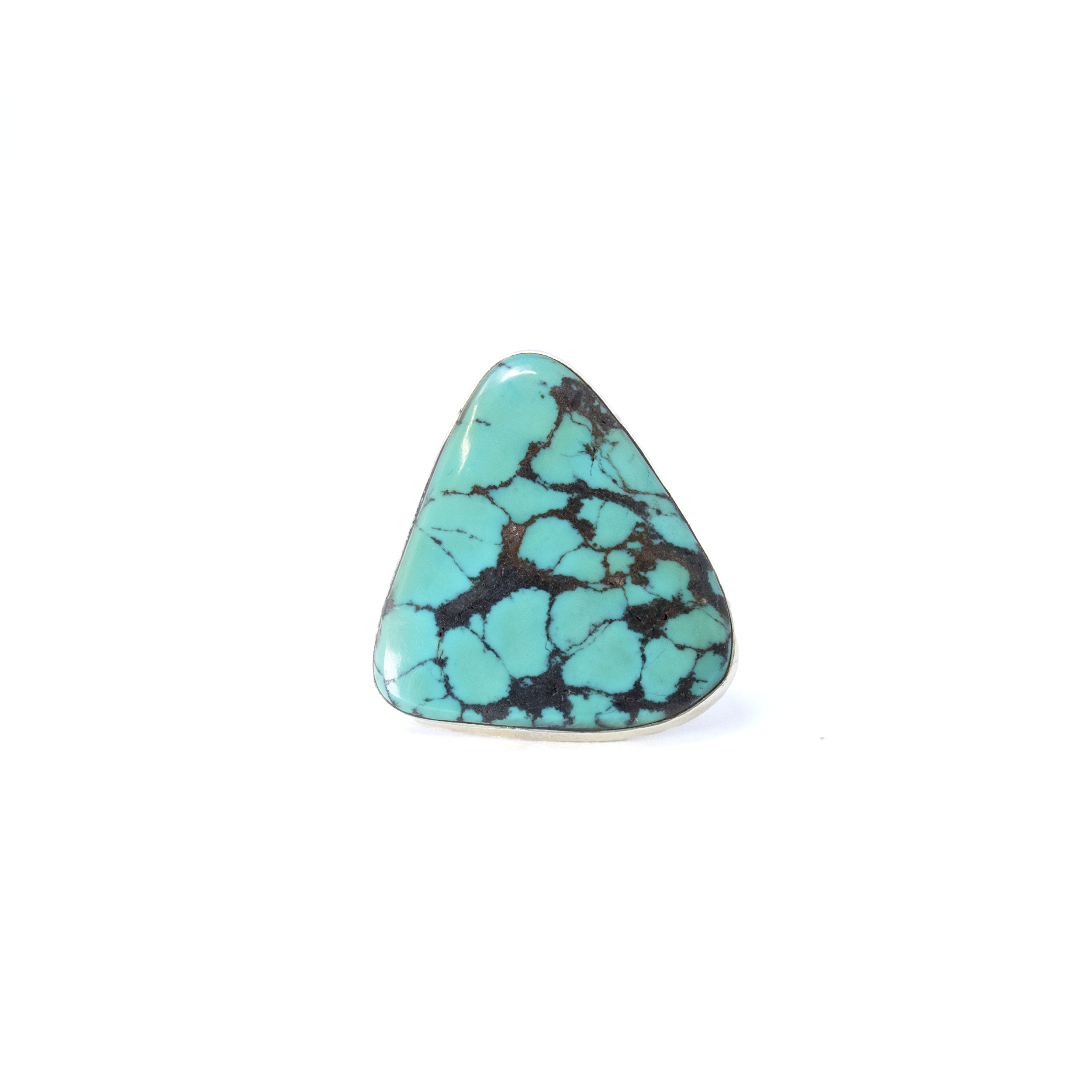 Experience the allure of the majestic Himalayas with our exquisite Turquoise Ring from Tibet. This stunning piece features a round cabochon of genuine turquoise, renowned for its captivating blue-green hues and unique patterns. Set in a high-quality 925 sterling silver bezel, this ring radiates elegance and sophistication. The bezel is expertly designed with a sun ray motif, adding a touch of celestial beauty to the piece. A refined rope accent embellishes the band, further enhancing its intricate craftsmanship and making it a standout addition to any jewelry collection. This exquisite ring is expertly crafted in size 8, ensuring a comfortable and secure fit for everyday wear or special occasions. Turquoise Ring from Tibet - Triangle Cabochon Set on Simple 925 Sterling Silver Bezel with sz8