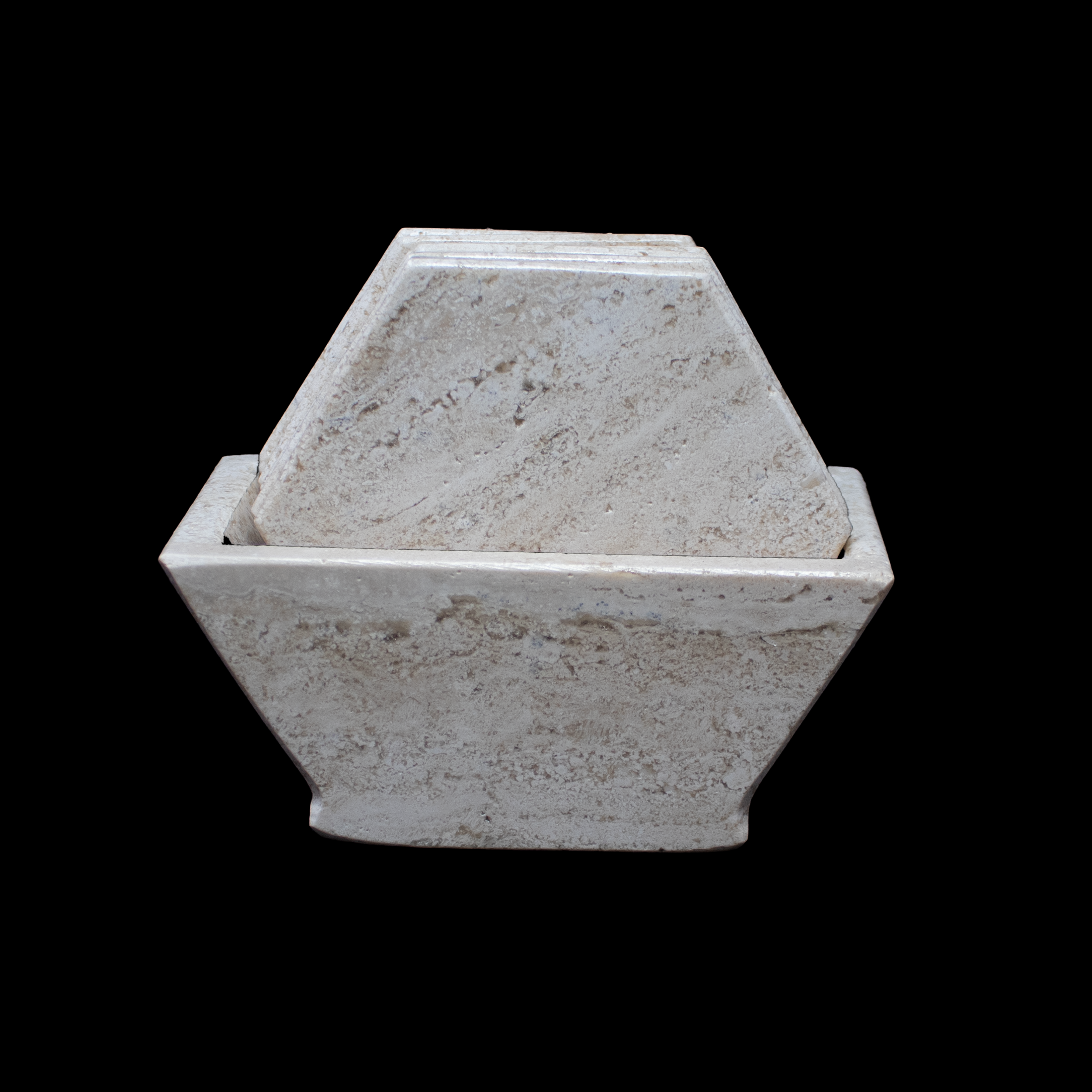 Refine your tabletop with the understated elegance of our Beige Travertine Coasters, a set of six hexagon-shaped pieces carved from genuine travertine stone. Each coaster features soft, sandy tones and distinctive natural veining, bringing a warm, organic touch to any décor style—from classic to contemporary.Durable and weighty, these coasters offer reliable protection against moisture and heat, making them ideal for both everyday use and special occasions. The set includes a matching holder that keeps your coasters neatly stored and beautifully displayed when not in use. Beige Travertine Coasters - Set of 6 with Holder - Hexagons
