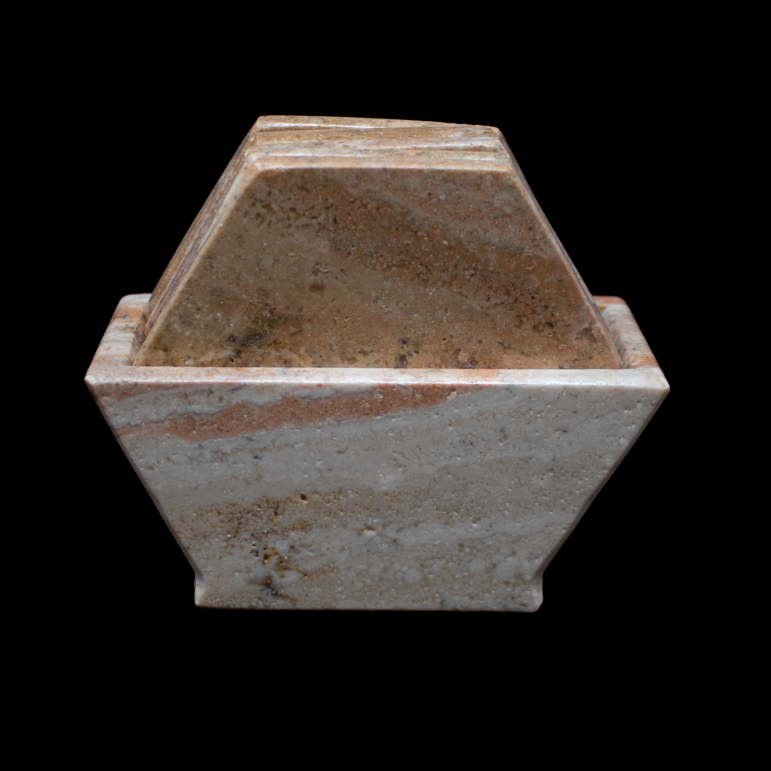 Bring warm, earthy elegance to your tabletop with our Carmel Travertine Onyx Coasters. Handcrafted into sleek hexagonal shapes, this set of six showcases the rich tonal variations and distinctive veining of genuine travertine onyx—each piece a natural original. The soft caramel hues and polished finish create a refined yet grounded aesthetic that enhances any setting.Designed for both form and function, these coasters protect your surfaces from moisture and heat while adding a sophisticated accent to coffee tables, dining areas, or office desks. A coordinating holder keeps the set neatly stored and ready for use. Carmel Travertine Onyx Coasters - Set of 6 with Holder - Hexagons