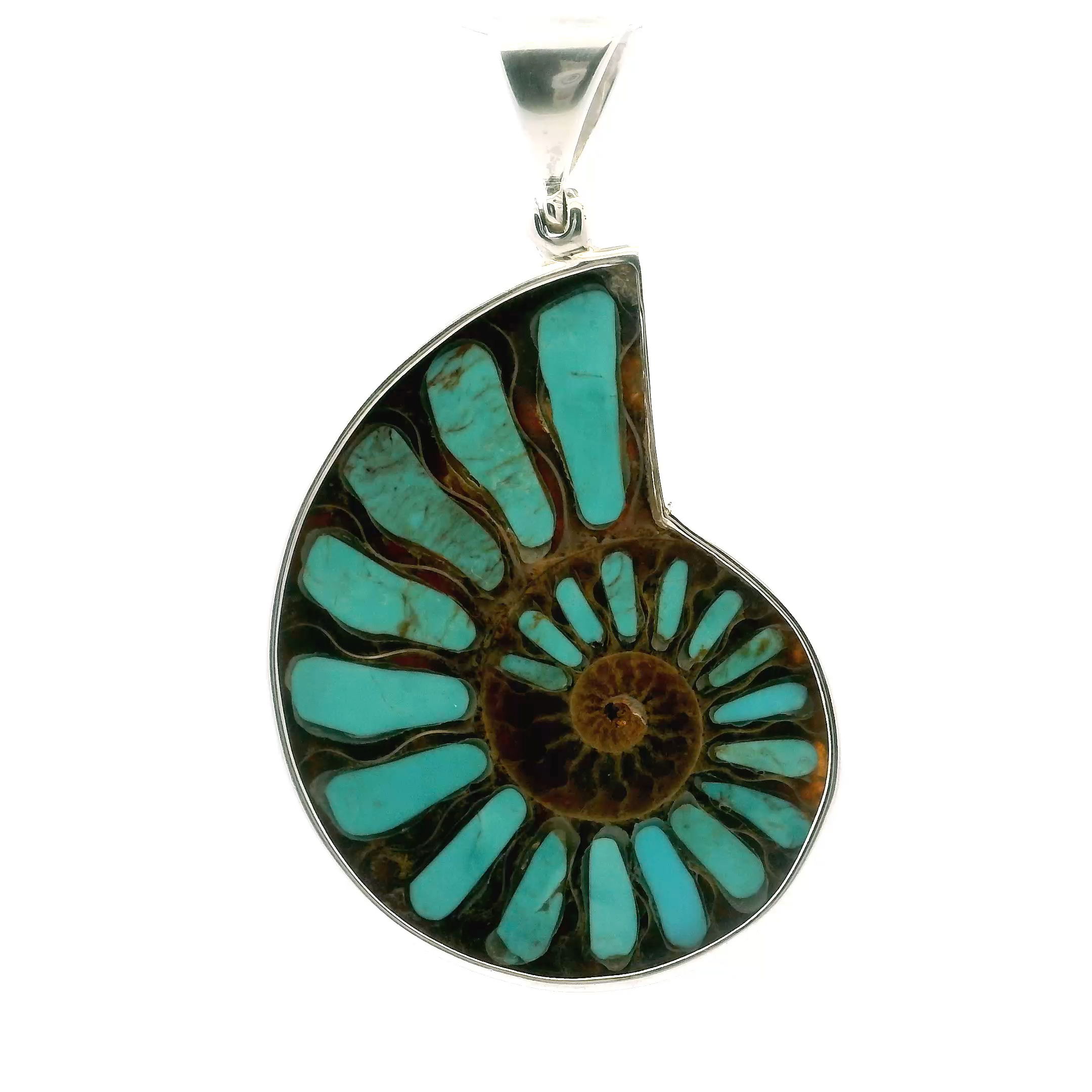 Celebrate natural beauty with our Ammonite Fossil Pendant, a timeless fusion of ancient artistry and modern elegance. An open ammonite cross-section, inlaid with vibrant aqua blue Arizona turquoise, radiates peaceful charm and vivid color. Minimal veining highlights the fossil’s intricate spiral, all bezel-set in high-quality 925 sterling silver. A unique conversation piece from Rare Earth Gallery, this pendant is perfect for women who appreciate individuality, history, and effortless style—beautifully suited for both everyday wear and special occasions. Ammonite Fossil Pendant - Open Ammonite Cross-section Inlaid with Aqua Blue Arizona Turquoise & Minimal Veining Bezel Set in 925 Sterling Silver