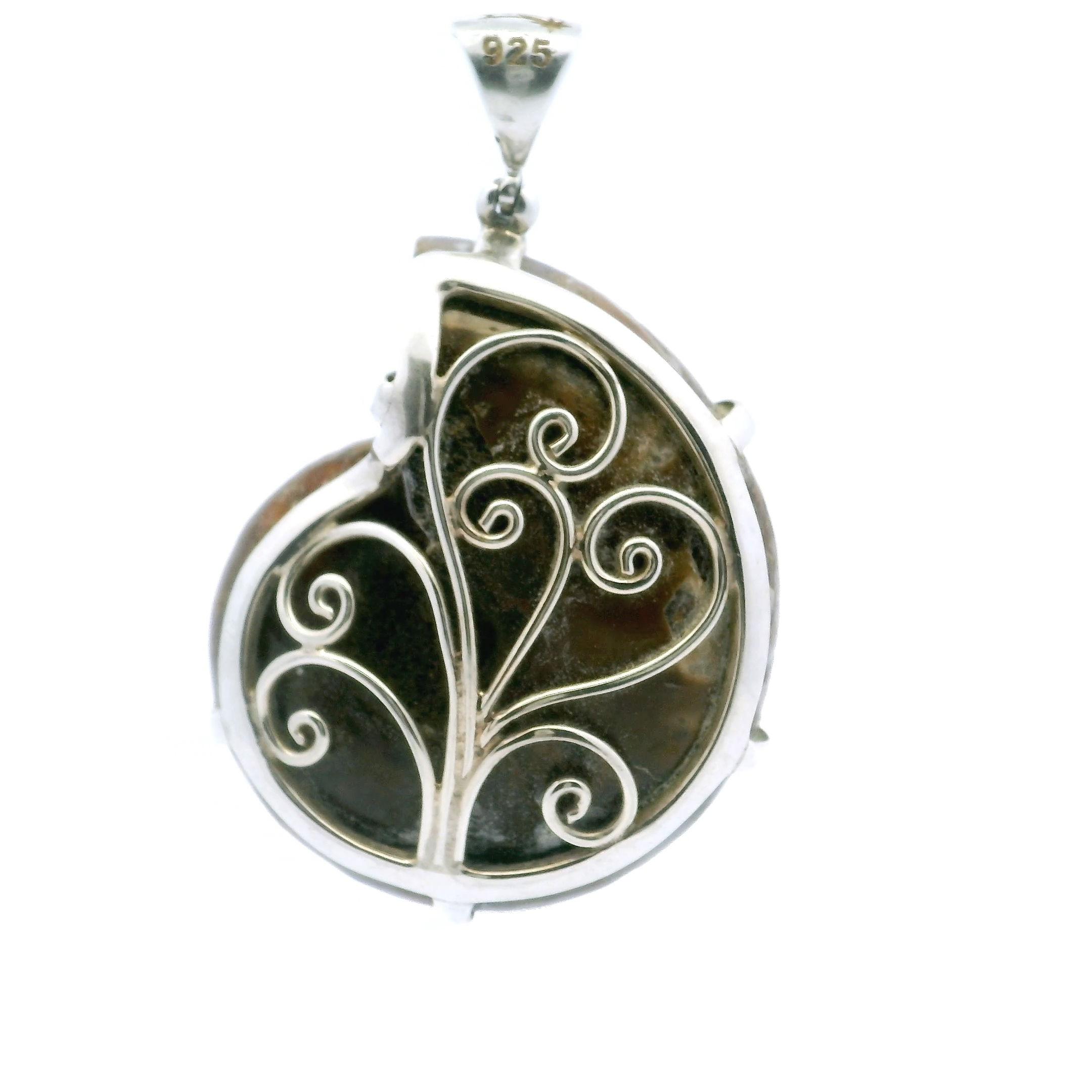Elevate your collection with our Ammonite Fossil Pendant, a rare fusion of ancient beauty and vibrant color. Featuring an open ammonite cross-section inlaid with striking bumblebee jasper, this piece is prong-set in 925 sterling silver for lasting elegance. A delicate swirl accent on the reverse side adds an artistic touch. Perfect for women who value unique craftsmanship, this pendant blends prehistoric wonder with modern style, making it a captivating statement for any occasion. Ammonite Fossil Pendant - Open Ammonite Cross-section Inlaid with Bumblebee Jasper Prong Set in 925 Sterling Silver with Swirled Accent on Reverse