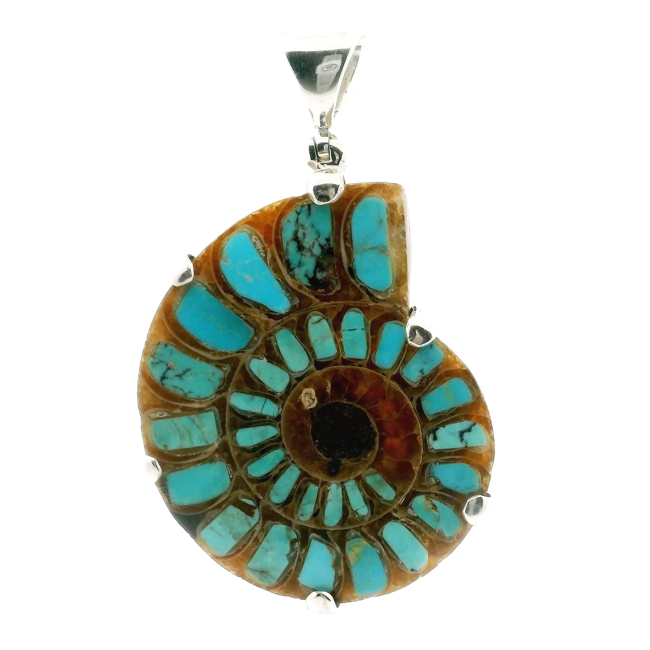 Discover natural history and timeless elegance with our Ammonite Fossil Pendant from Rare Earth Gallery. Featuring an open ammonite cross-section inlaid with vibrant blue Arizona turquoise and delicate veining, this pendant blends ancient beauty with modern style. Prong-set in 925 sterling silver, each piece is a unique glimpse into Earth's prehistoric past. Perfect for those who appreciate rare, meaningful treasures, this pendant brings a touch of nature’s artistry to any occasion. Ammonite Fossil Pendant - Open Ammonite Cross-section Inlaid with Vibrant Blue Arizona Turquoise & Some Dark Veining Prong Set in 925 Sterling Silver