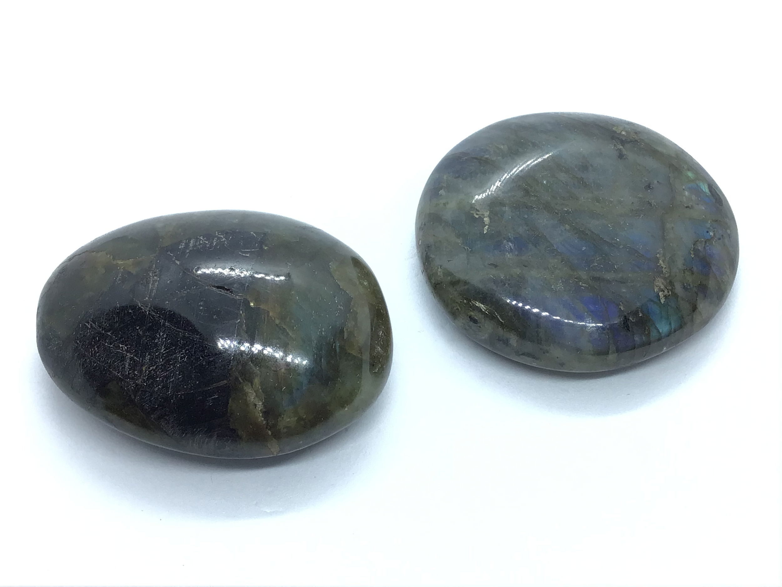 This hand-polished Labradorite Palm Stone from Madagascar reveals brilliant flashes of blue, green, and gold with every turn. Smooth and compact, it’s perfect for meditation, energy work, or simply admiring its natural beauty.Known as the “Stone of Magic,” Labradorite is believed to enhance intuition and provide energetic protection. A stunning piece for collectors, healers, or anyone drawn to its radiant, mystical charm. Labradorite Palm Stone from Madagascar