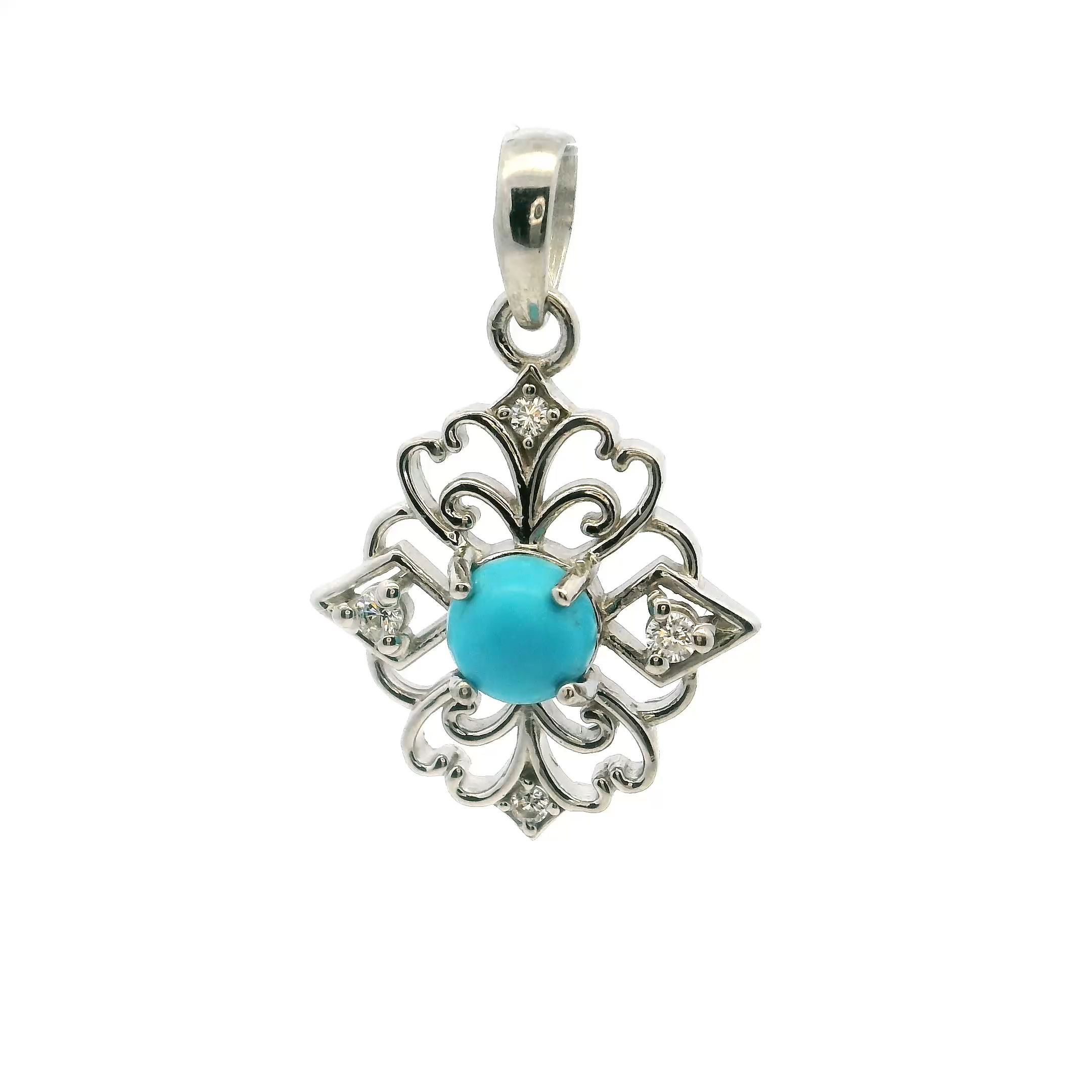 This New Mexican Turquoise Pendant centers around a vivid round cabochon, its signature blue hue laced with natural marbling that speaks to the stone’s Southwestern origin. Four clear cubic zirconia accents form a delicate mandala around the turquoise, adding a whisper of brilliance and spiritual geometry without overwhelming the natural stone. Each element is prong-set in polished 925 sterling silver, ensuring both durability and refined craftsmanship.The pendant hangs with quiet poise, offering a harmonious blend of tradition and modern elegance. Ideal for women drawn to symbolic detail and the calming energy of turquoise, this piece lends itself effortlessly to both everyday wear and more elevated styling. A gentle celebration of form, light, and meaning—this pendant is a quiet standout. New Mexican Turquoise Pendant - Round Cabochon with 4 CZs in Mandala Shape Prong Set in 925 Sterling Silver