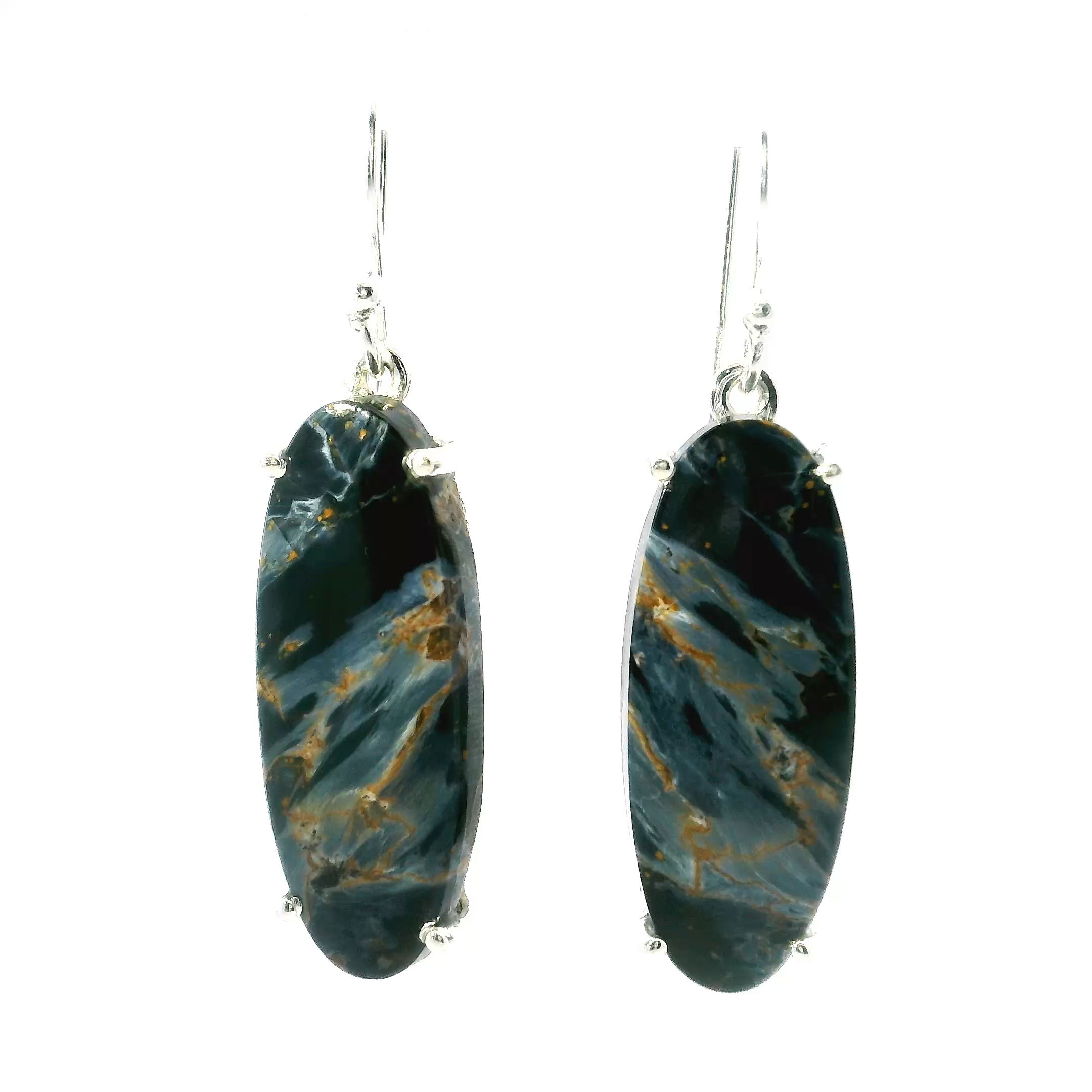 These elegant earrings feature elongated oval Pietersite cabochons with striking diagonal swirls of blue and brown, prong set in polished 925 sterling silver. Their graceful dangle design adds movement and subtle shimmer with every step.Perfect for daily elegance or evening wear, they combine natural beauty with refined craftsmanship—an ideal statement piece for any jewelry lover drawn to bold color and timeless style. Pietersite Dangle Earrings - Elongated Oval with Diagonal Blue & Brown Lines Prong Set in 925 Sterling Silver