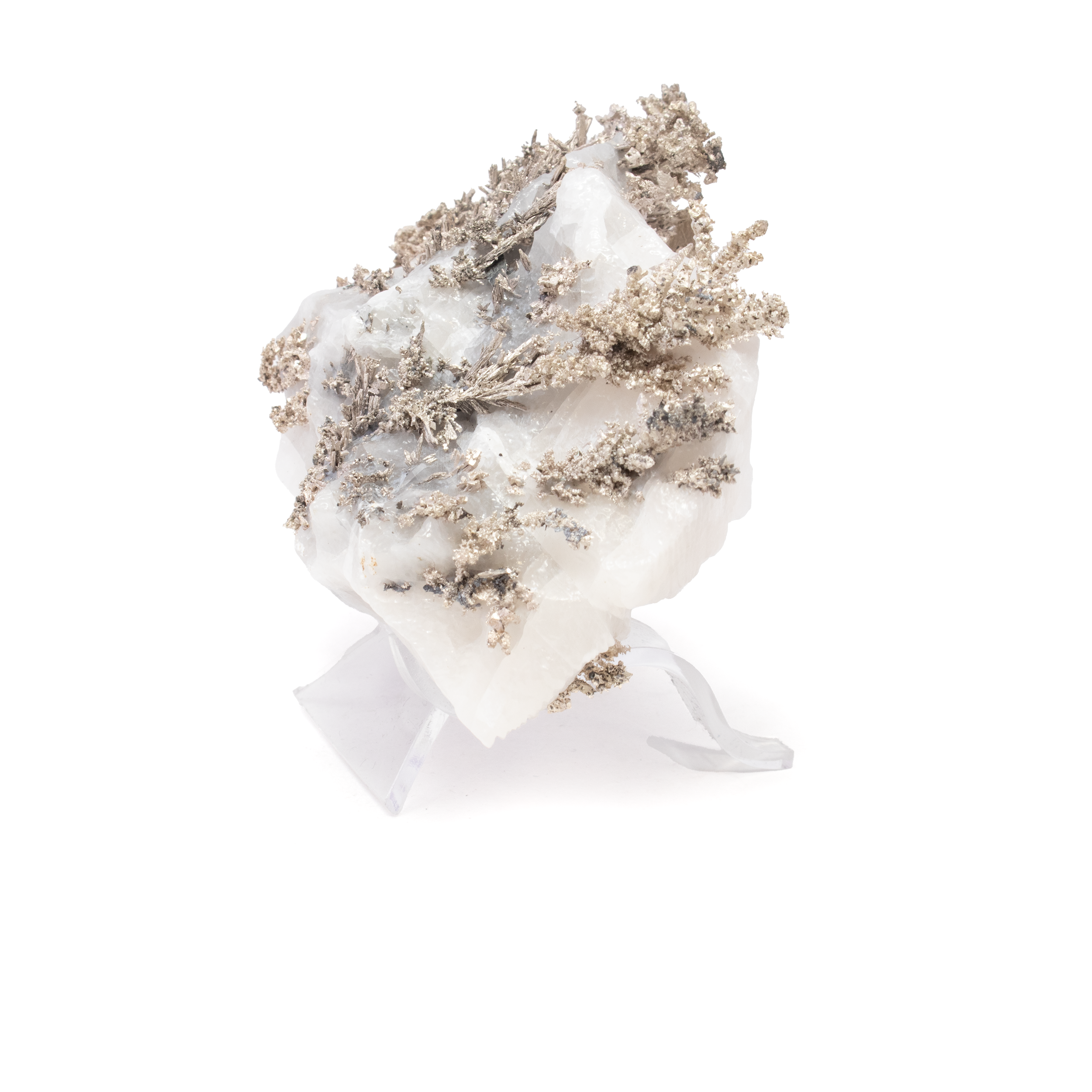This specimen features lustrous silver minerals intricately embedded in a stunning quartz matrix, an extraordinary collector’s piece that unites natural beauty with refined presentation. Lustrous silver threads weave through a glistening quartz matrix, creating a dynamic contrast of metallic sheen and crystalline sparkle.Mounted on a clear Lucite stand, this specimen is elevated to a gallery-worthy display—perfect for desks, shelves, or cabinets. A one-of-a-kind geological marvel, it’s ideal for collectors and crystal enthusiasts who value both aesthetic appeal and scientific rarity. Silver Mineral on Quartz Matrix with Lucite Stand