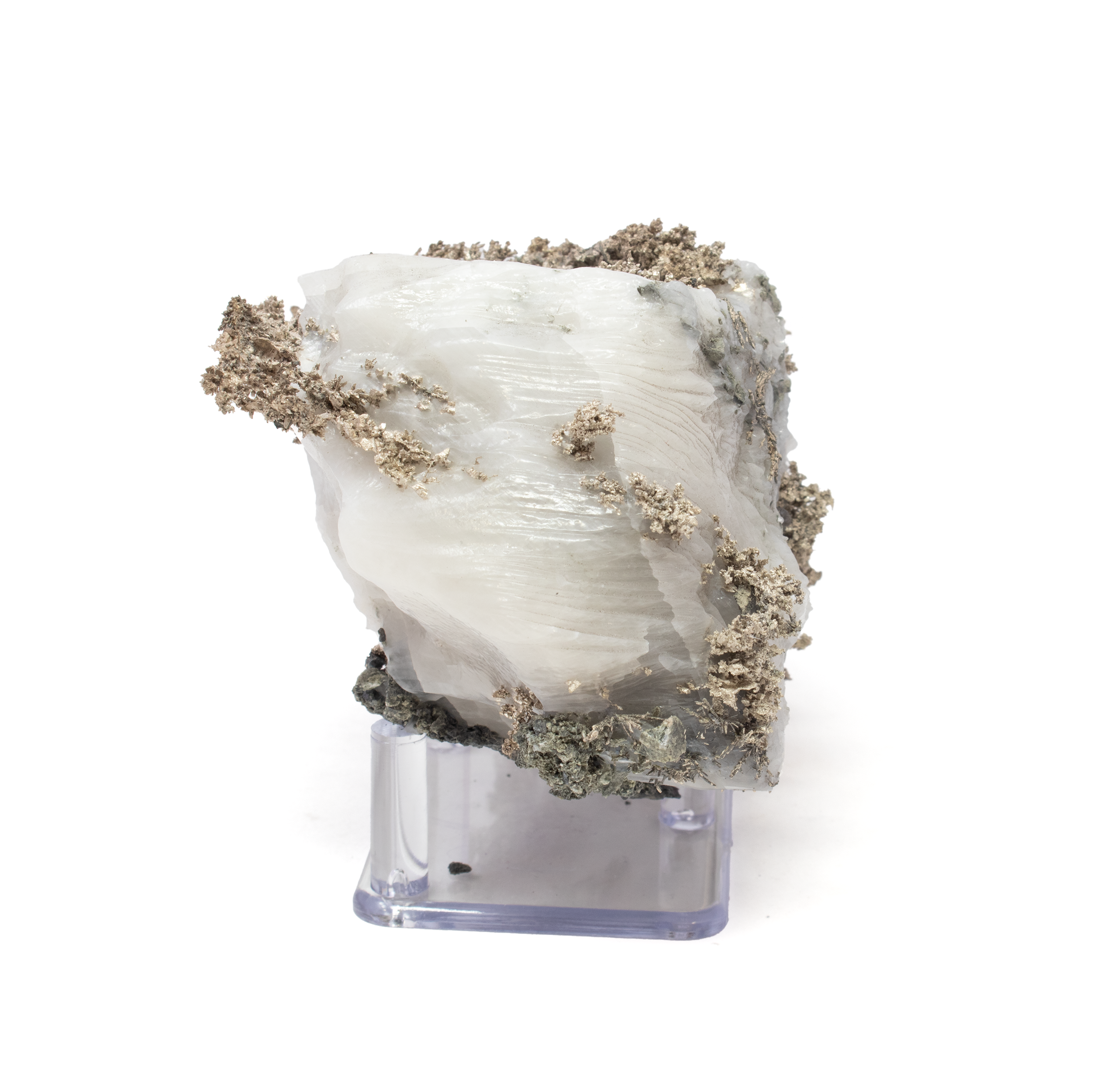 This specimen features lustrous silver minerals intricately embedded in a stunning quartz matrix, an extraordinary collector’s piece that unites natural beauty with refined presentation. Lustrous silver threads weave through a glistening quartz matrix, creating a dynamic contrast of metallic sheen and crystalline sparkle.Mounted on a clear Lucite stand, this specimen is elevated to a gallery-worthy display—perfect for desks, shelves, or cabinets. A one-of-a-kind geological marvel, it’s ideal for collectors and crystal enthusiasts who value both aesthetic appeal and scientific rarity. Silver Mineral on Quartz Matrix with Lucite Stand