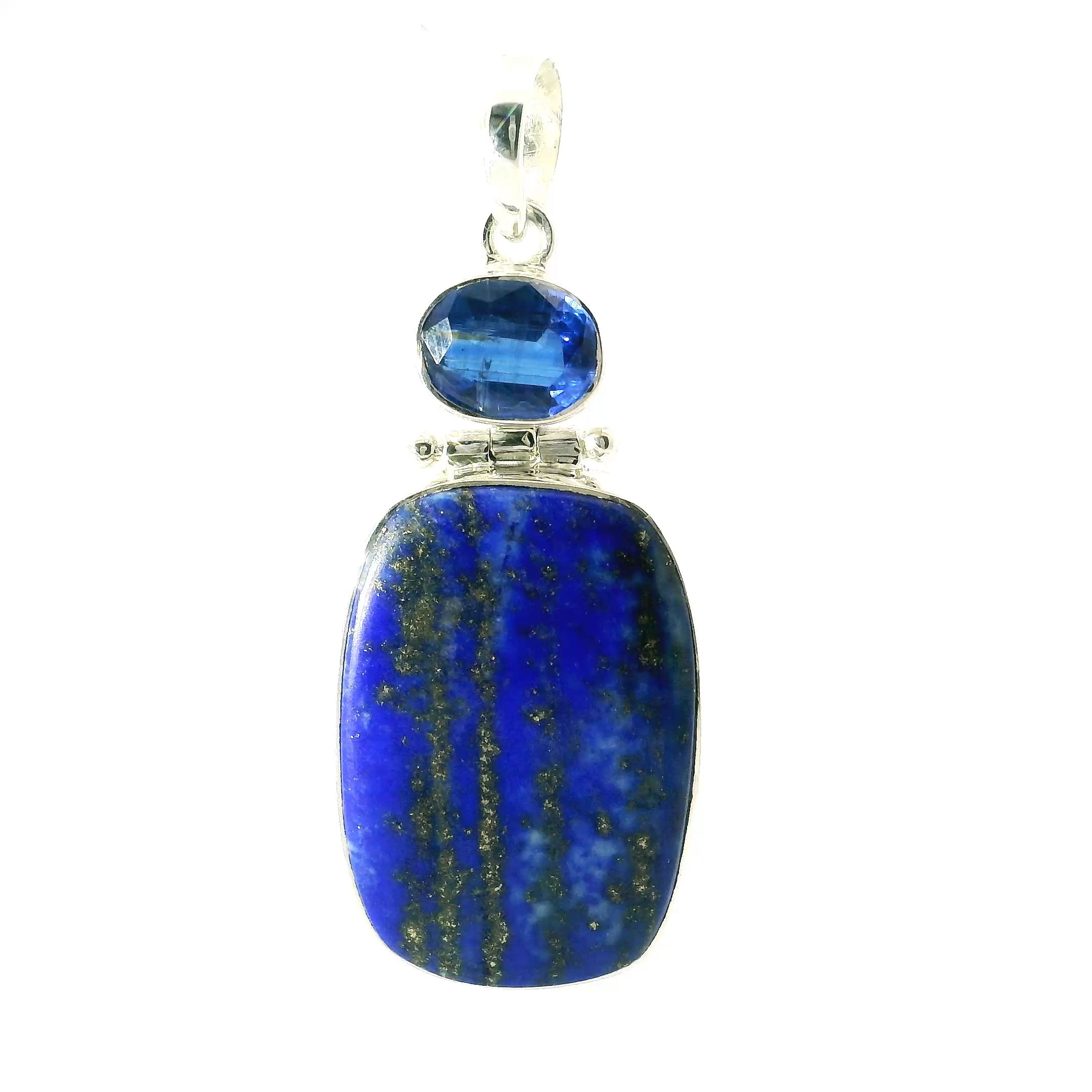 Lapis Lazuli and Kyanite Pendant in Sterling Silver, a striking fusion of bold color and refined craftsmanship. This pendant features a wide, rounded rectangular cabochon of deep royal blue lapis lazuli, flecked with natural golden pyrite and paired with a faceted east-west oval kyanite that shimmers with icy, silken blue tones. Both stones are bezel set in high-quality 925 sterling silver, offering a sleek, polished finish that enhances their vivid hues.Designed for versatility and elegance, this pendant makes a powerful standalone statement or layers beautifully with other necklaces. A perfect choice for lovers of celestial-toned gemstone jewelry, and an ideal gift for those who appreciate the balance of modern design with timeless, earth-sourced beauty. Lapis Lazuli Pendant - Wide Rounded Rectangular Cabochon Below Faceted East-West Kyanite Oval Bezel Set in 925 Sterling Silver