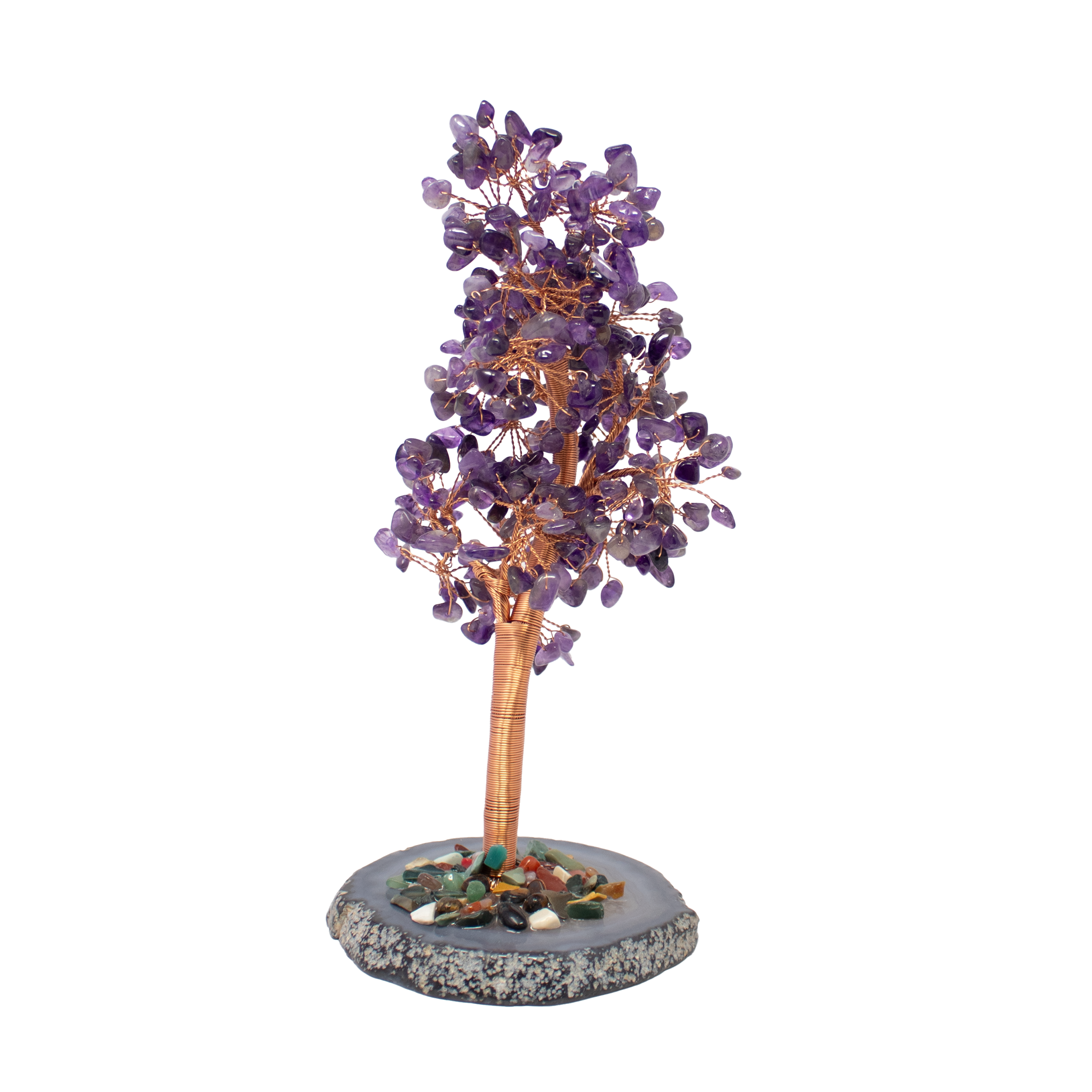 Rooted in a gleaming slice of natural agate, this 8" Amethyst Copper Wire Beaded Tree brings together the calming energy of amethyst and the grounding beauty of earth’s crystal artistry. Twisted copper wire branches bloom with genuine amethyst beads, their soft purple hues radiating tranquility, intuition, and spiritual clarity.Elegant and eye-catching, the tree rises from its polished base like a living sculpture, perfect as a focal point for desks, shelves, or sacred spaces. Both a decorative accent and an energetic centerpiece, this handcrafted tree evokes growth, balance, and peaceful presence—ideal for gifting or daily inspiration. 8" Amethyst Copper Wire Beaded Tree on Agate Slice Base - Large