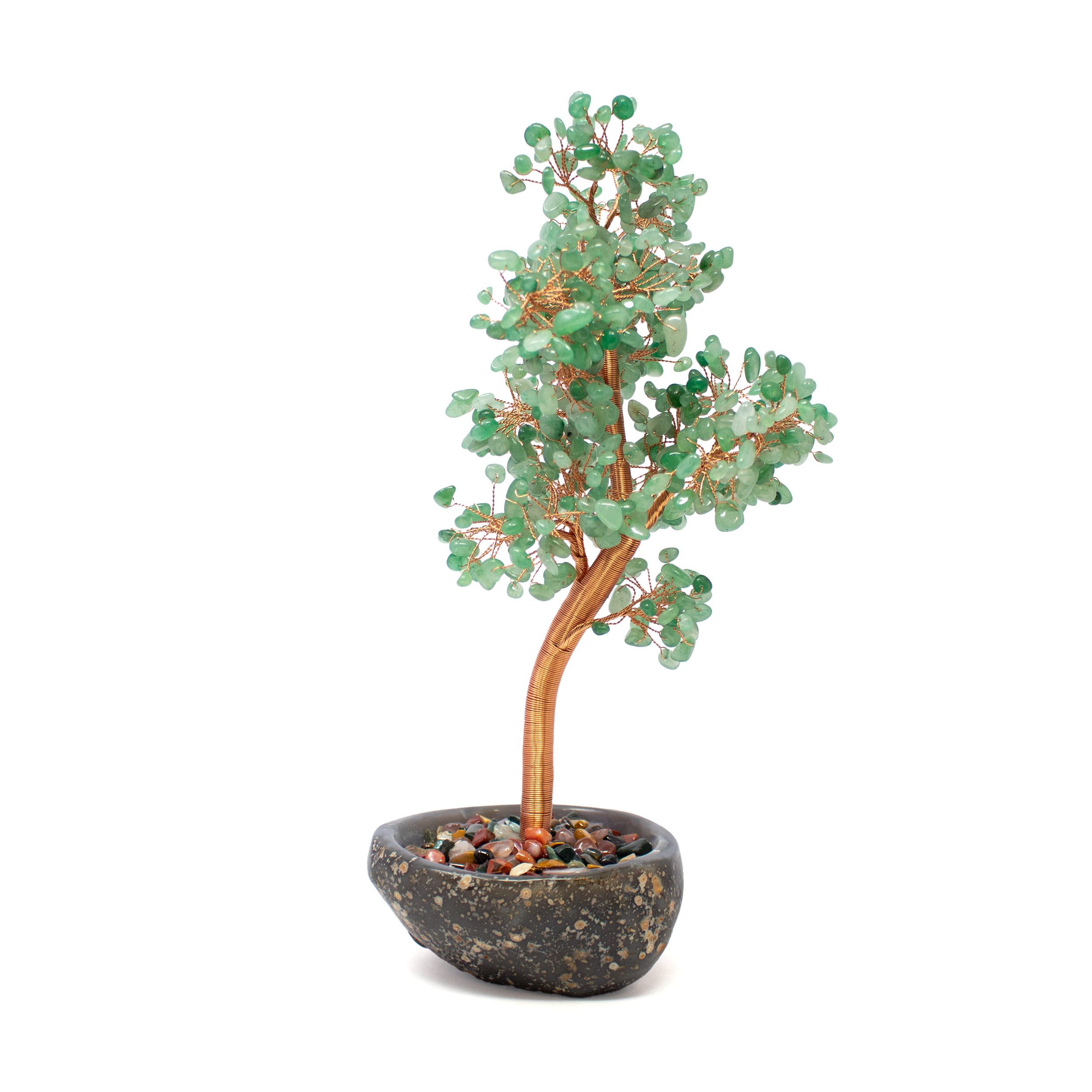 Bring balance and beauty into your space with this handcrafted Aventurine Copper Wire Beaded Tree, elegantly rooted in a polished agate dish and surrounded by a vibrant garden of multicolor gemstone pebbles. Each aventurine bead, delicately wrapped in copper wire, forms lush green foliage symbolizing growth, abundance, and renewal. The tree rises from a grounding agate base, its natural banding offering both stability and visual depth, while the surrounding gemstone chips infuse the piece with color, texture, and positive energy.Ideal for home, office, or sacred space, this one-of-a-kind sculpture blends earthy elegance with calming metaphysical properties, making it a thoughtful gift or personal talisman of serenity and abundance. Aventurine Copper Wire Beaded Tree in Agate Dish with Multicolor Gemstone Pebbles